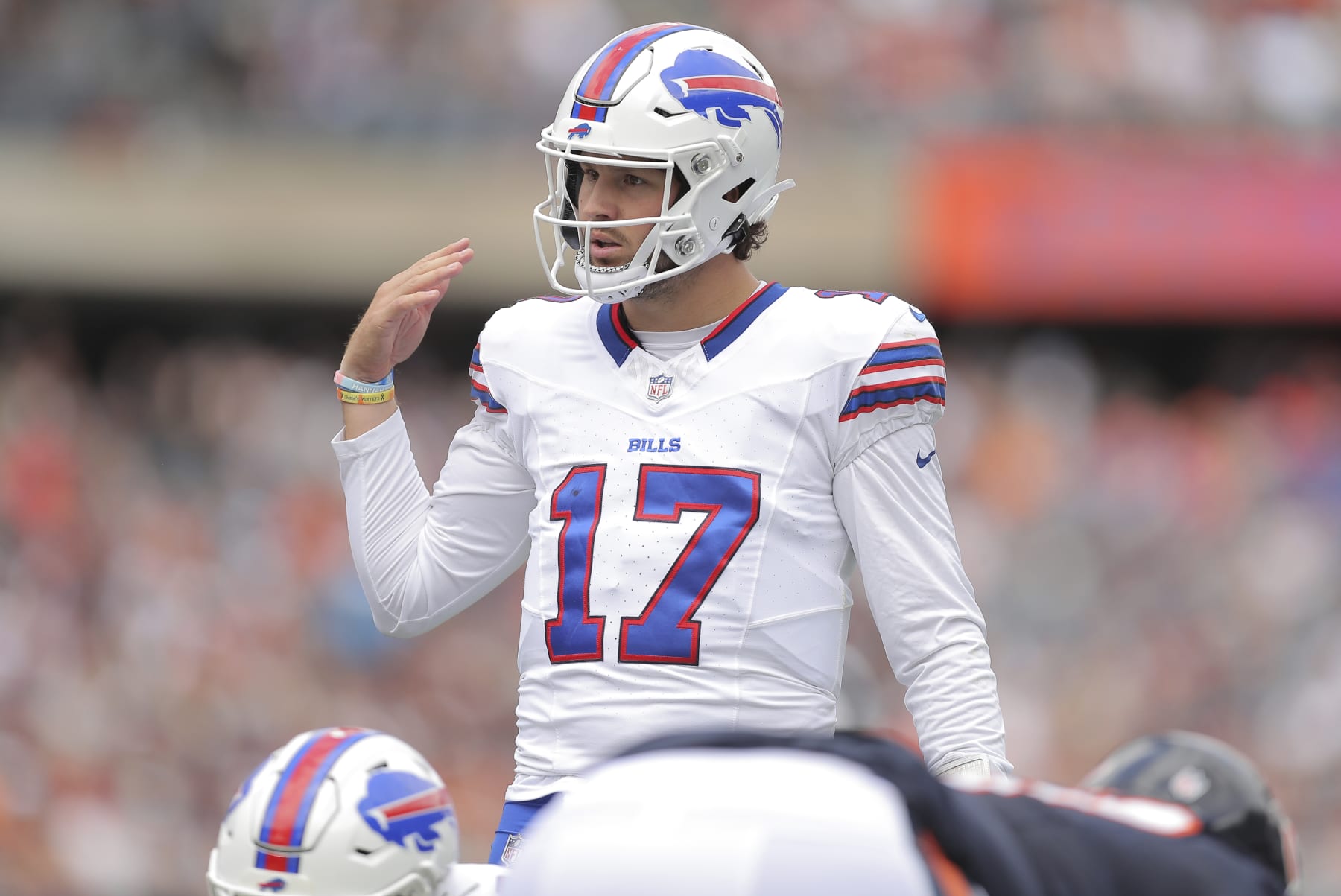 Buffalo Bills quarterback Josh Allen (17) calls a play during an NFL football preseason game against the Chicago Bears, Saturday, Aug. 26, 2023, in Chicago. (AP Photo/Melissa Tamez)
