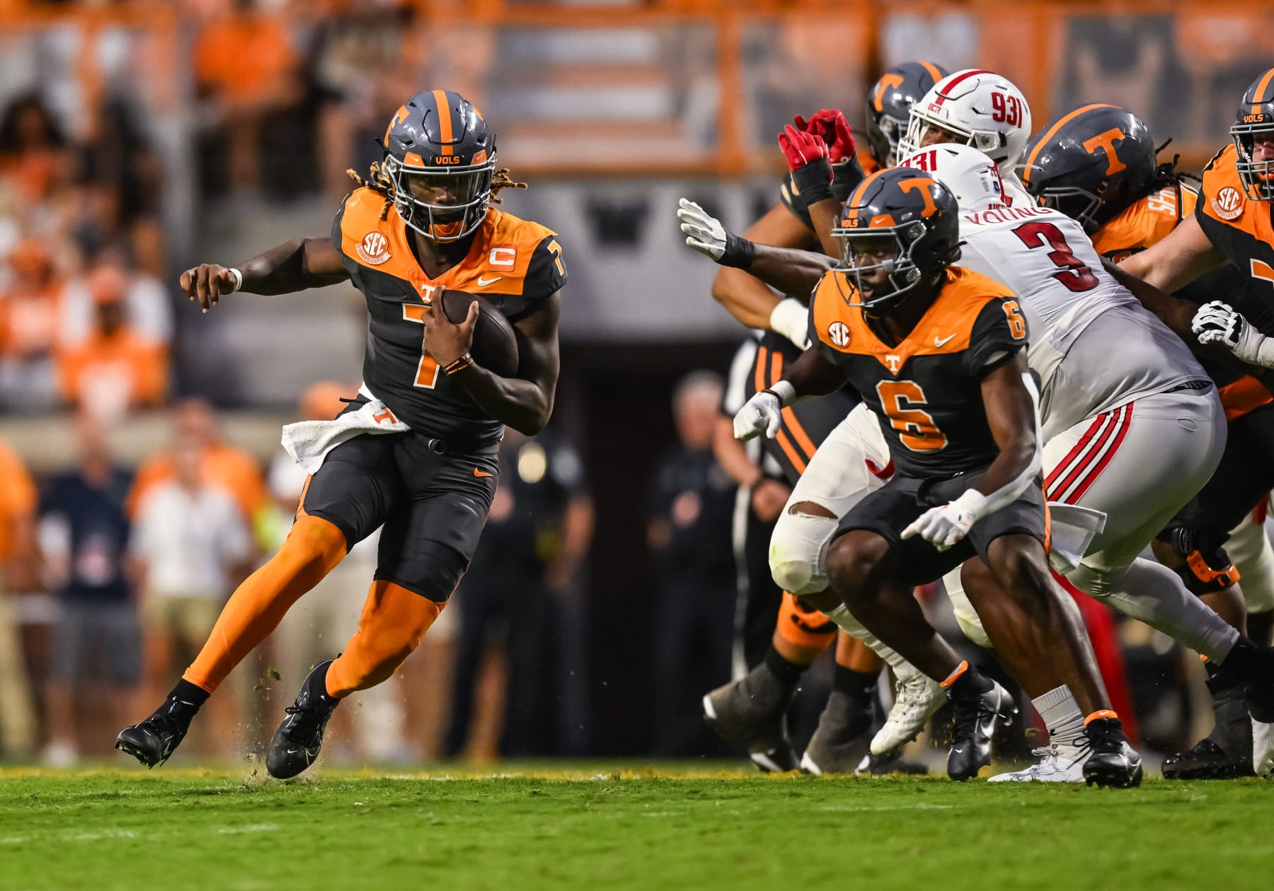 KNOXVILLE, TN - SEPTEMBER 09: Tennessee Volunteers quarterback Joe Milton III (7) runs the ball during the college football game between the Tennessee Volunteers and the Austin Peay Governors on September 9, 2023, at Neyland Stadium, in Knoxville, TN. (Photo by Bryan Lynn/Icon Sportswire via Getty Images)