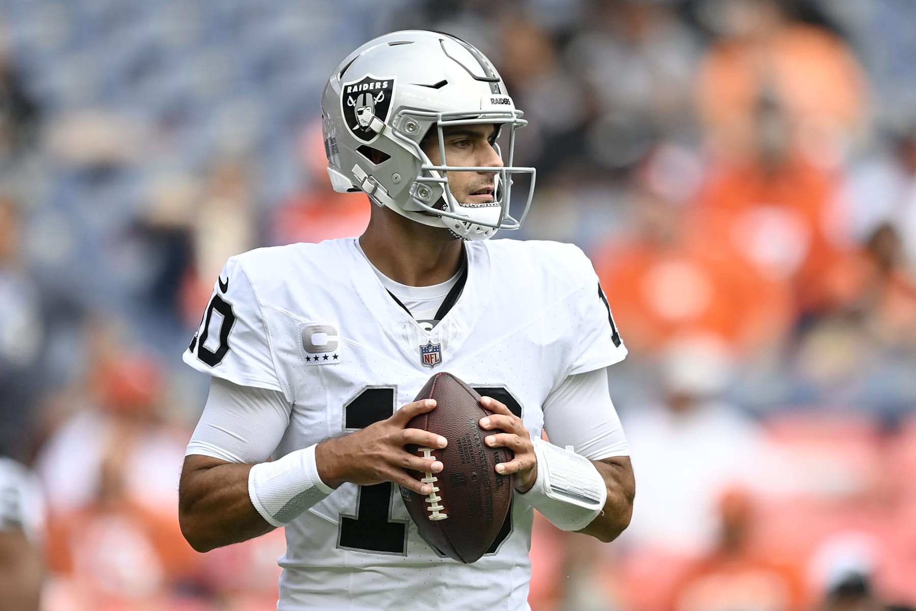 DENVER, COLORADO - SEPTEMBER 10: Jimmy Garoppolo #10 of the Las Vegas Raiders warms up during pregame against the Denver Broncos at Empower Field At Mile High on September 10, 2023 in Denver, Colorado. (Photo by Dustin Bradford/Getty Images)