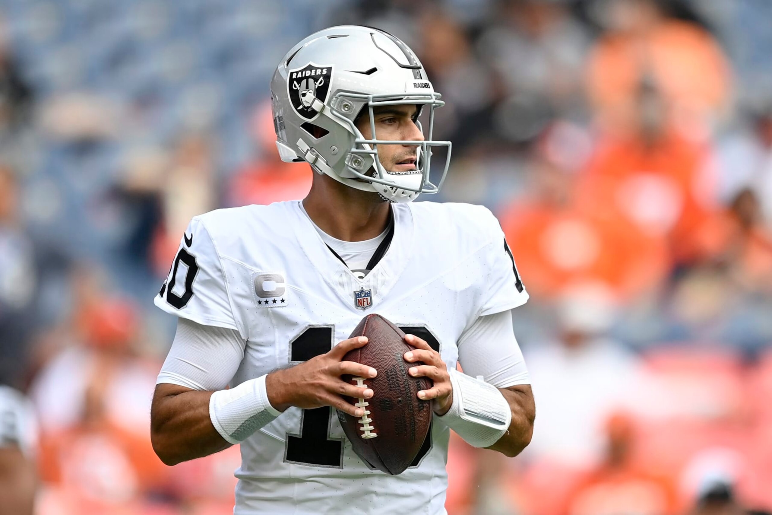 DENVER, COLORADO - SEPTEMBER 10: Jimmy Garoppolo #10 of the Las Vegas Raiders warms up during pregame against the Denver Broncos at Empower Field At Mile High on September 10, 2023 in Denver, Colorado. (Photo by Dustin Bradford/Getty Images)