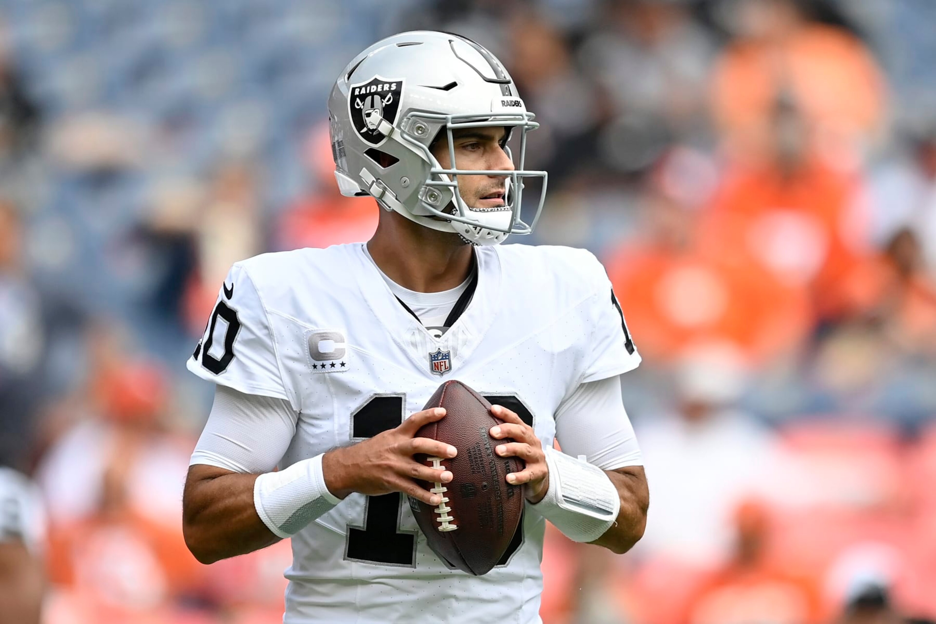 DENVER, COLORADO - SEPTEMBER 10: Jimmy Garoppolo #10 of the Las Vegas Raiders warms up during pregame against the Denver Broncos at Empower Field At Mile High on September 10, 2023 in Denver, Colorado. (Photo by Dustin Bradford/Getty Images)