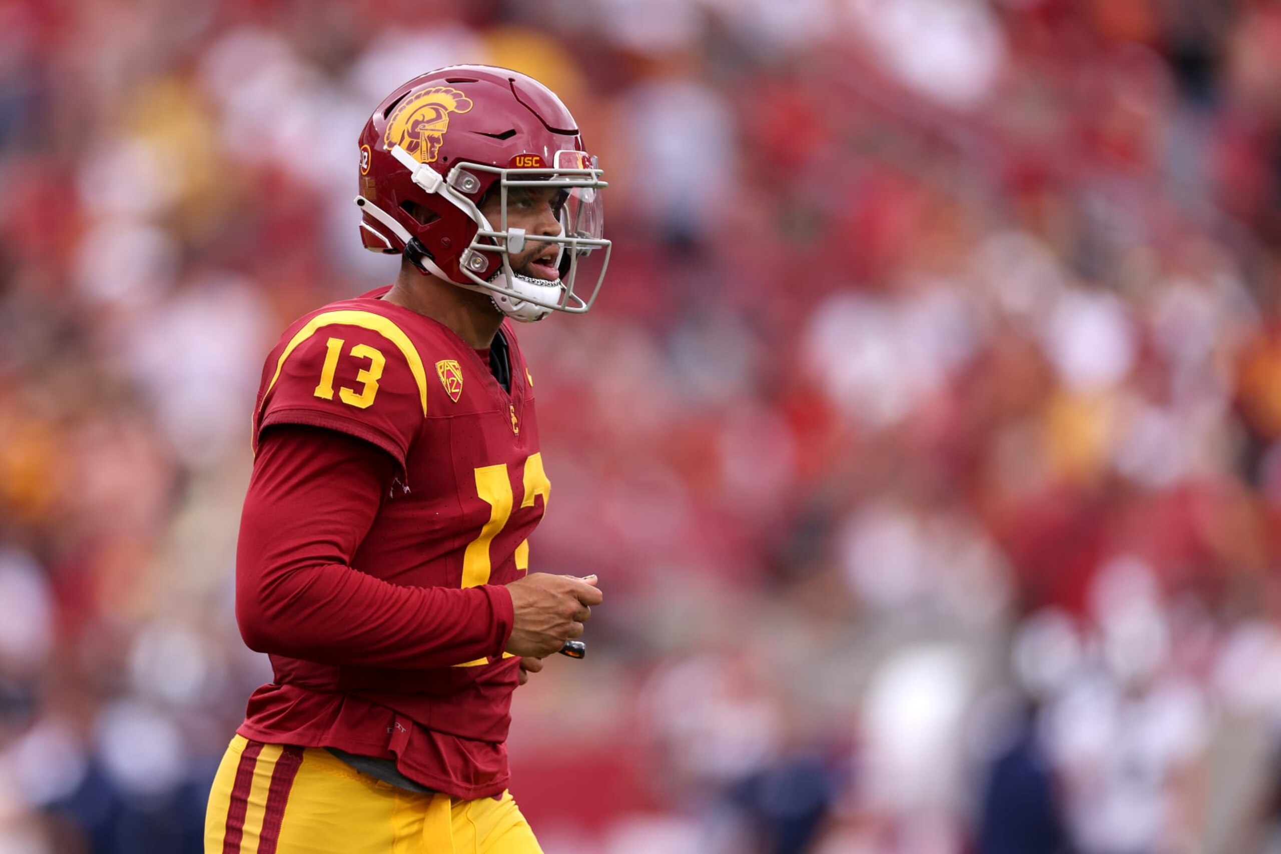 LOS ANGELES, CALIFORNIA - SEPTEMBER 02: Caleb Williams #13 of the USC Trojans jogs off the field during the second quarter against the Nevada Wolf Pack at United Airlines Field at the Los Angeles Memorial Coliseum on September 02, 2023 in Los Angeles, California. (Photo by Katelyn Mulcahy/Getty Images)