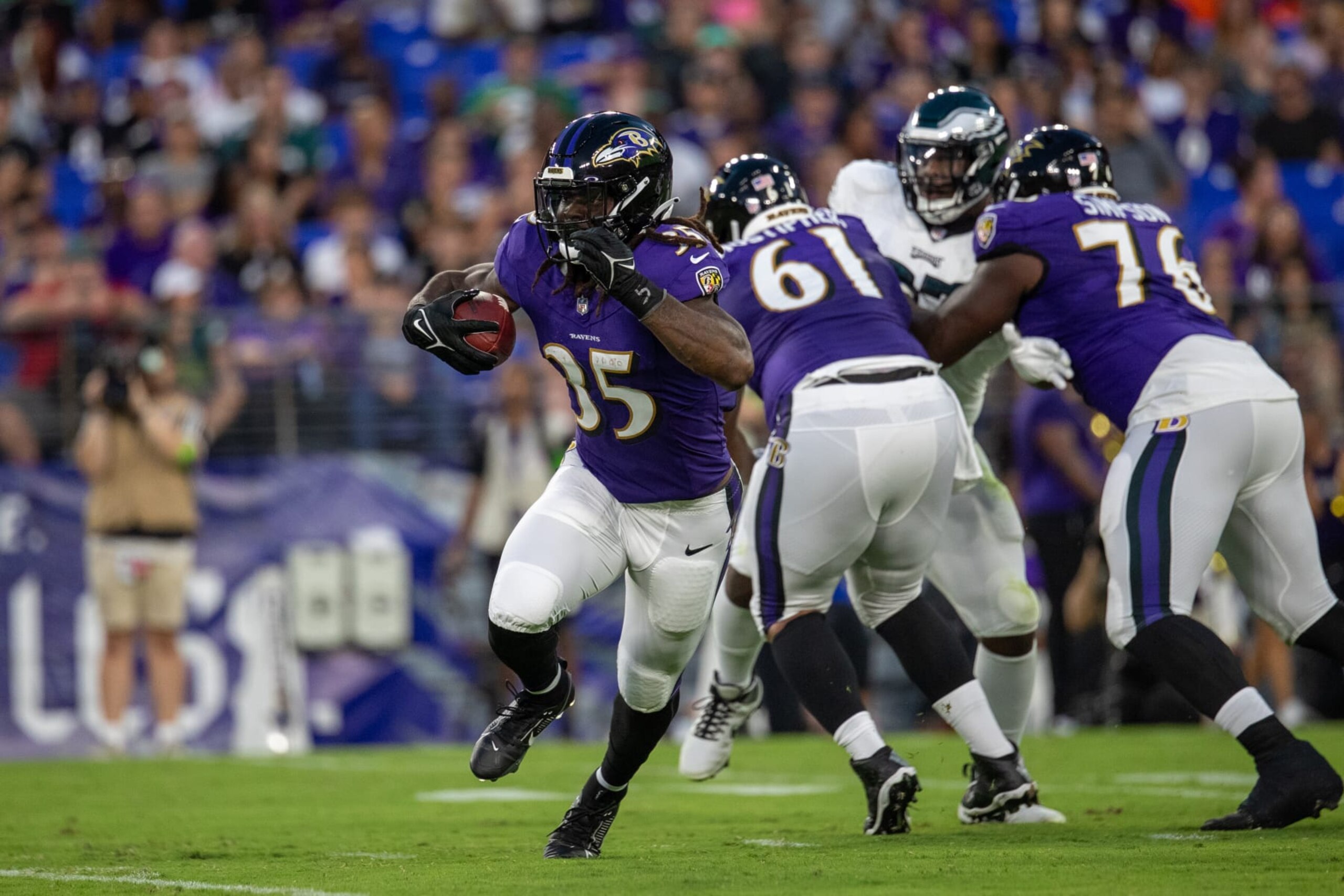 BALTIMORE, MD - AUGUST 12: Baltimore Ravens running back Gus Edwards (35) finds a running lane during an NFL pre-season game between the Philadelphia Eagles and the Baltimore Ravens on August 12, 2023, at M&T Bank Stadium in Baltimore, Maryland. (Photo by Charles Brock/Icon Sportswire via Getty Images)