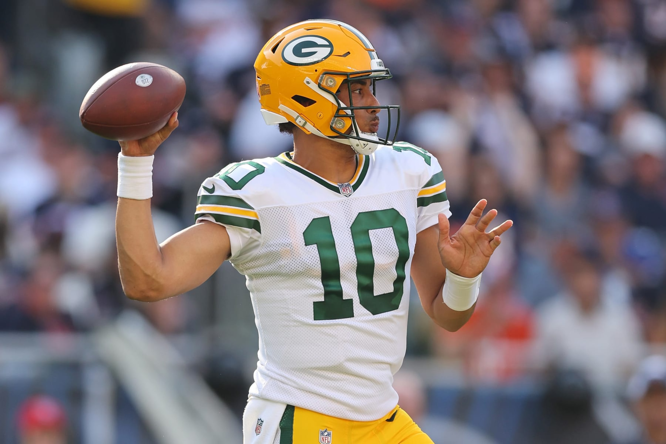 CHICAGO, ILLINOIS - SEPTEMBER 10:  Jordan Love #10 of the Green Bay Packers throws a pass against the Chicago Bears during the first half at Soldier Field on September 10, 2023 in Chicago, Illinois. (Photo by Michael Reaves/Getty Images)