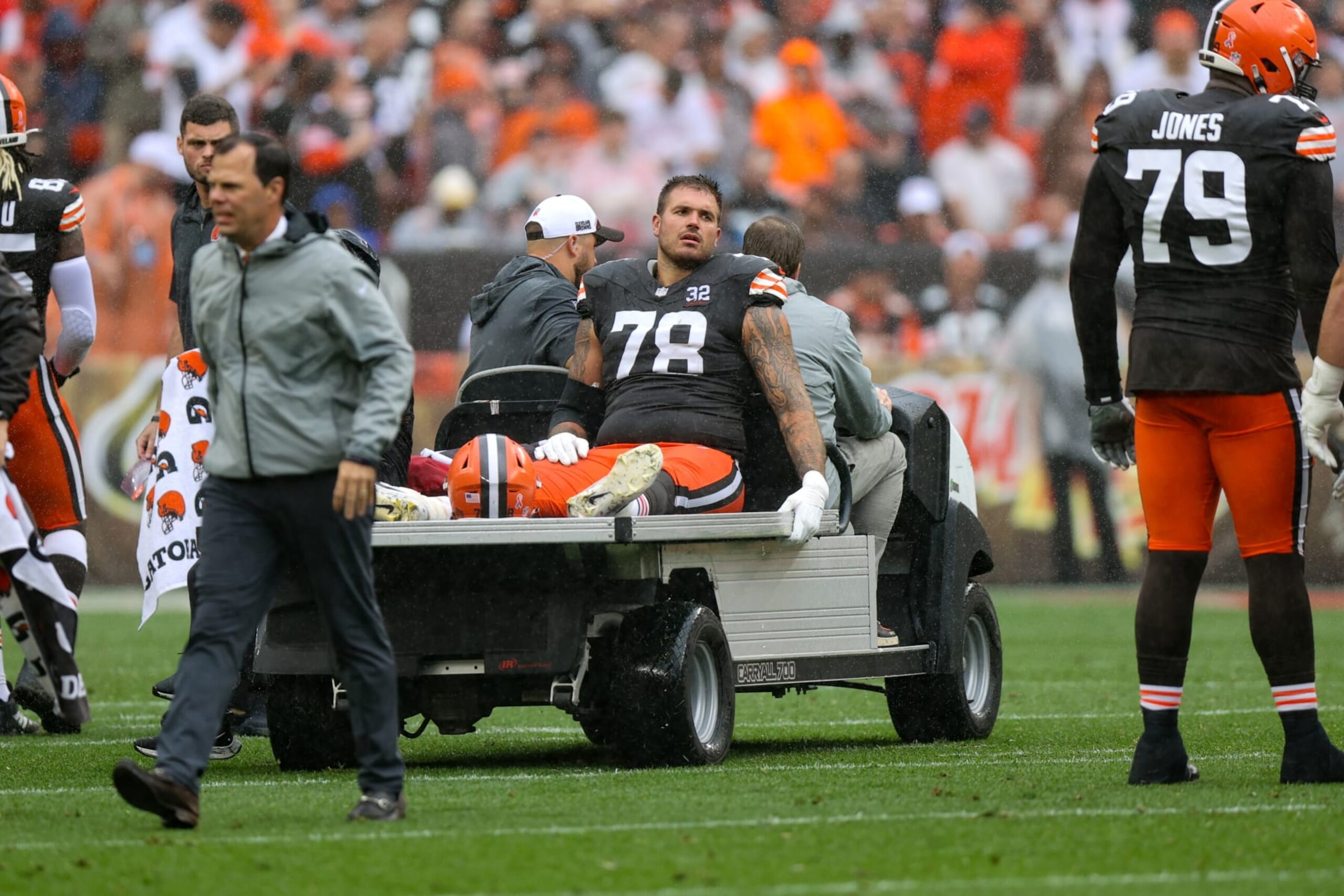 CLEVELAND, OH - SEPTEMBER 10: Cleveland Browns offensive tackle Jack Conklin (78) leaves the field on a cart after injuring his leg during the second quarter of the National Football League game between the Cincinnati Bengals and Cleveland Browns on September 10, 2023, at Cleveland Browns Stadium in Cleveland, OH. (Photo by Frank Jansky/Icon Sportswire via Getty Images)