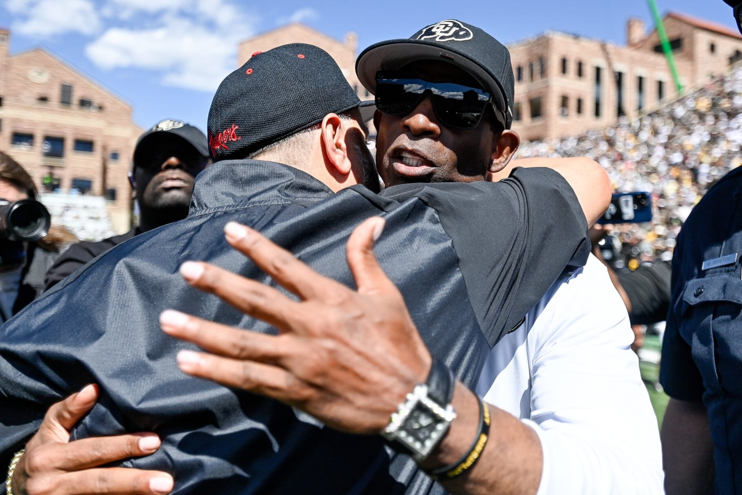 BOULDER, CO - SEPTEMBER 9:  Head coach Matt Rhule of the Nebraska Cornhuskers and head coach Deion Sanders of the Colorado Buffaloes have a word after a Colorado Buffaloes win at Folsom Field on September 9, 2023 in Boulder, Colorado. (Photo by Dustin Bradford/Getty Images)