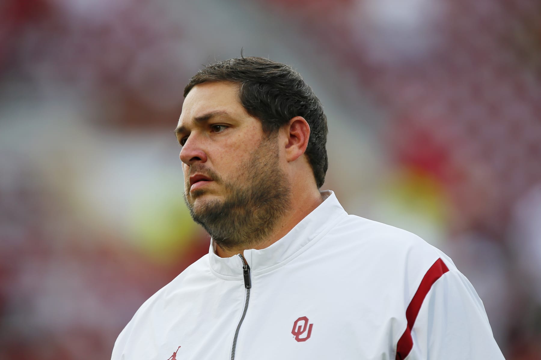 NORMAN, OK - SEPTEMBER 10:  Offensive coordinator Jeff Lebby of the Oklahoma Sooners watches the team before a game against the Kent State Golden Flashes at Gaylord Family Oklahoma Memorial Stadium on September 10, 2022 in Norman, Oklahoma.  Oklahoma won 33-3. (Photo by Brian Bahr/Getty Images)