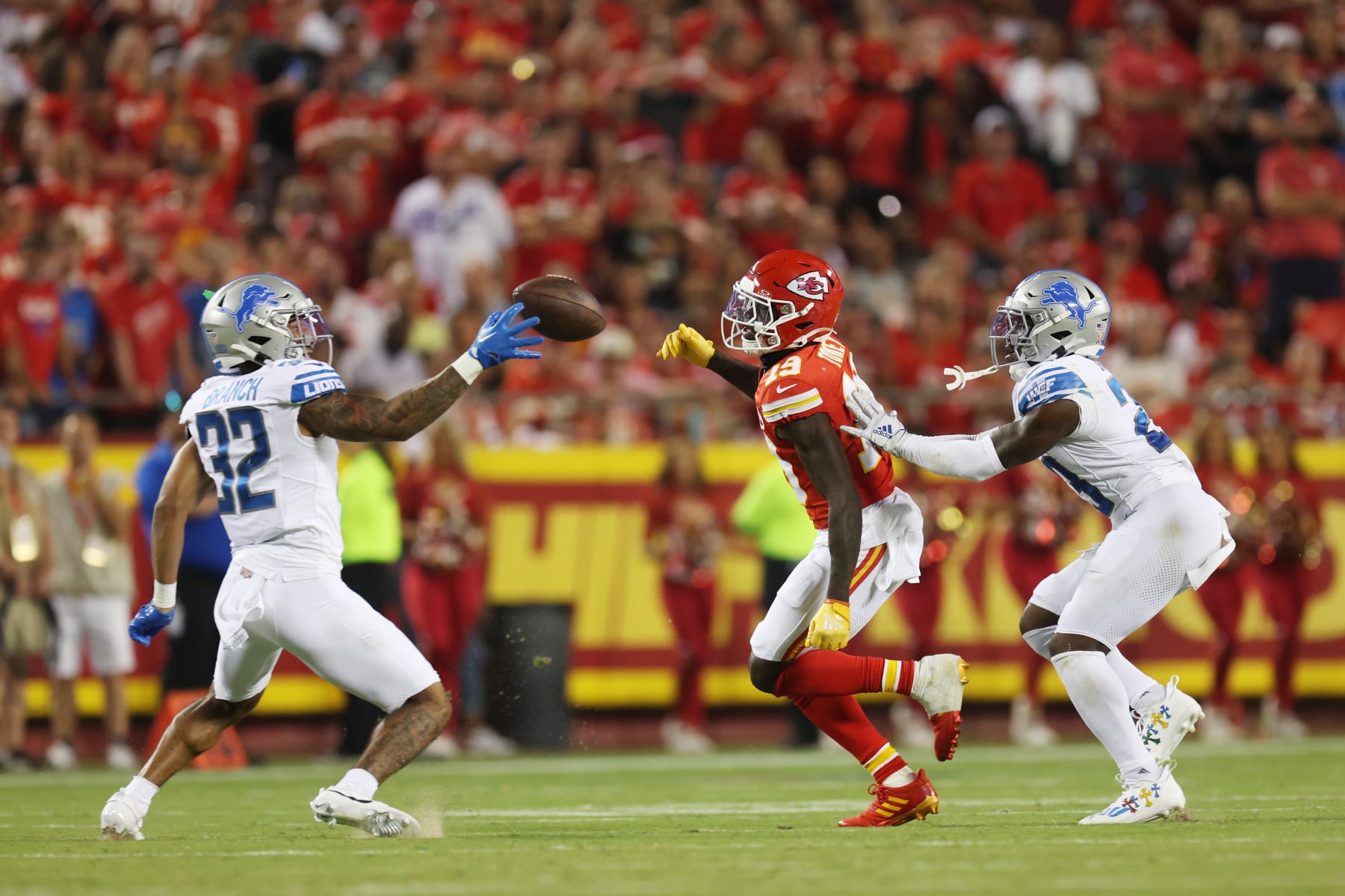 KANSAS CITY, MISSOURI - SEPTEMBER 07: Brian Branch #32 of the Detroit Lions intercepts a pass intended for Kadarius Toney #19 of the Kansas City Chiefs for a touchdown in the third quarter at GEHA Field at Arrowhead Stadium on September 07, 2023 in Kansas City, Missouri. (Photo by Jamie Squire/Getty Images)