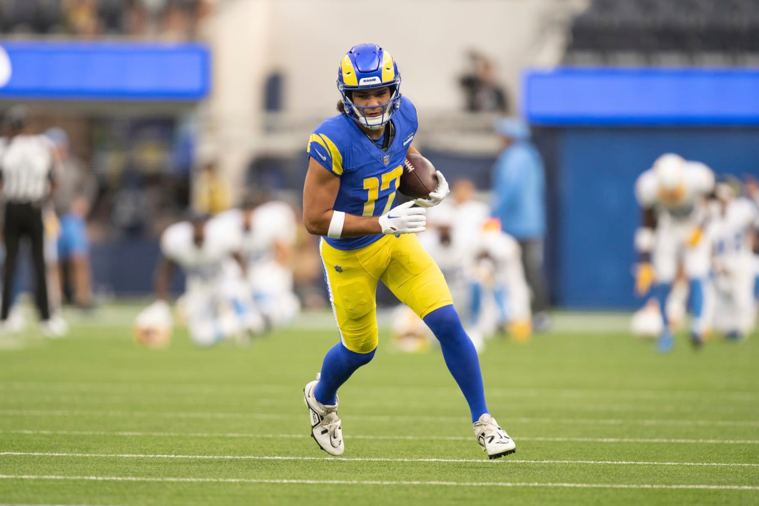 Los Angeles Rams wide receiver Puka Nacua (17) runs with the ball before an NFL preseason football game ast the Los Angeles Chargers, Saturday, Aug. 12, 2023, in Inglewood, Calif. (AP Photo/Kyusung Gong)