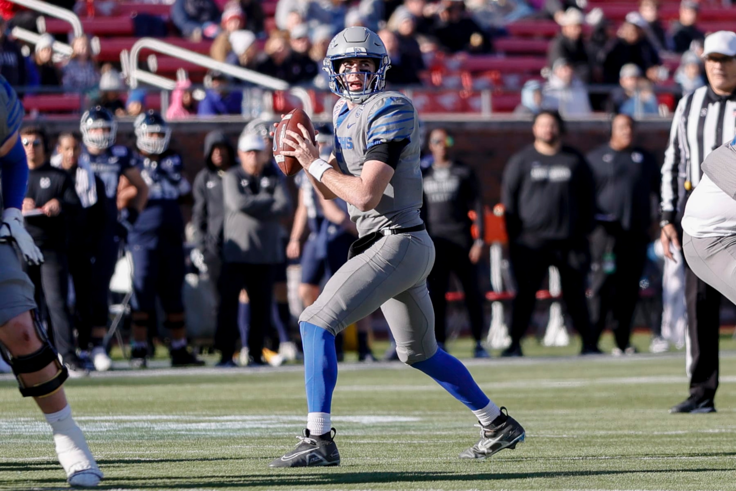 DALLAS, TX - DECEMBER 27: Memphis Tigers quarterback Seth Henigan (5) looks downfield for an open receiver during the SERVPRO First Responder Bowl game between the Memphis Tigers and the Utah State Aggies on December 27, 2022 at Gerald J. Ford Stadium in Dallas, Texas. (Photo by Matthew Pearce/Icon Sportswire via Getty Images)