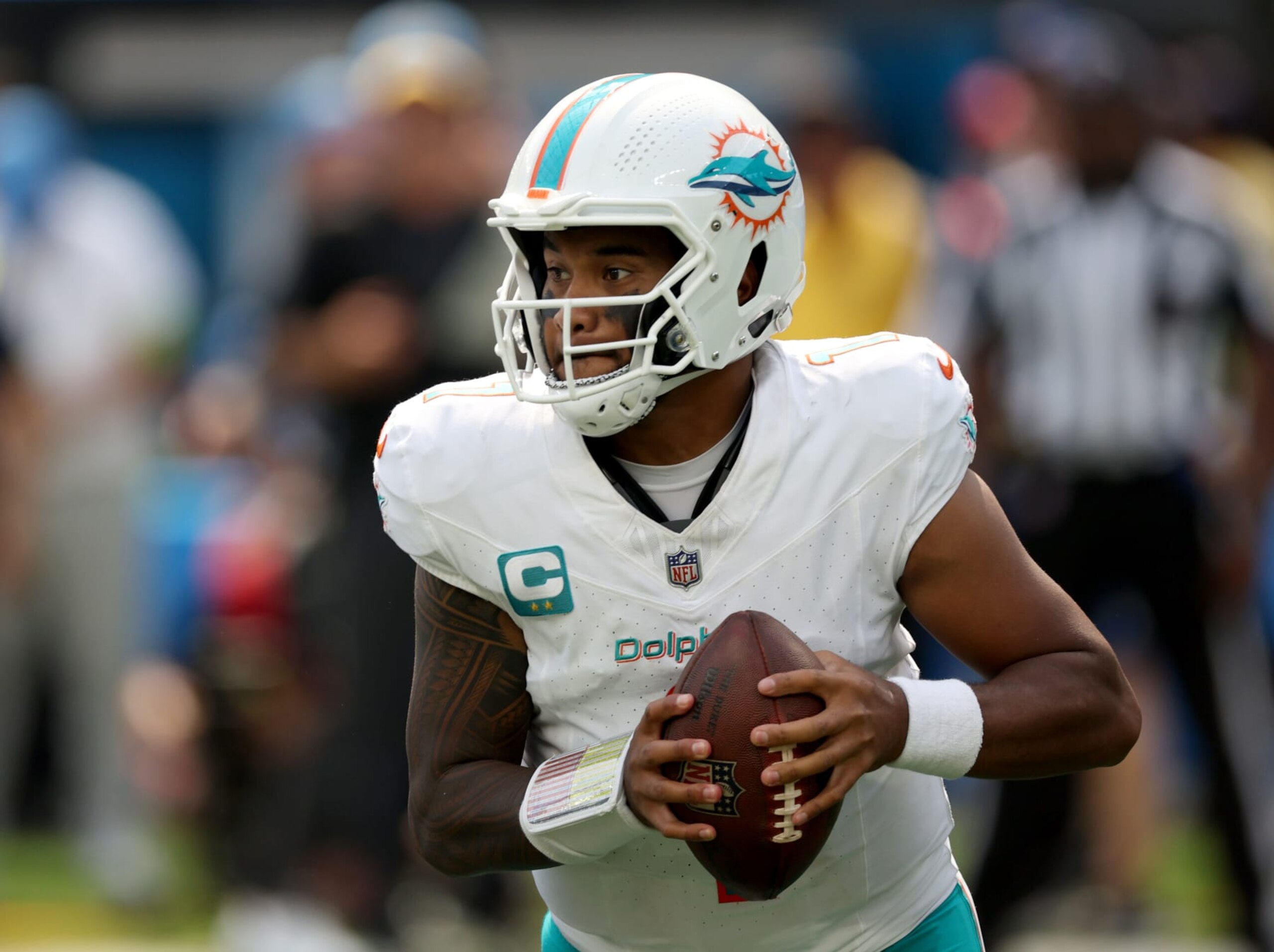 INGLEWOOD, CALIFORNIA - SEPTEMBER 10: Tua Tagovailoa #1 of the Miami Dolphins drops back to pass during a 36-34 Dolphins win over the Los Angeles Chargers at SoFi Stadium on September 10, 2023 in Inglewood, California. (Photo by Harry How/Getty Images)