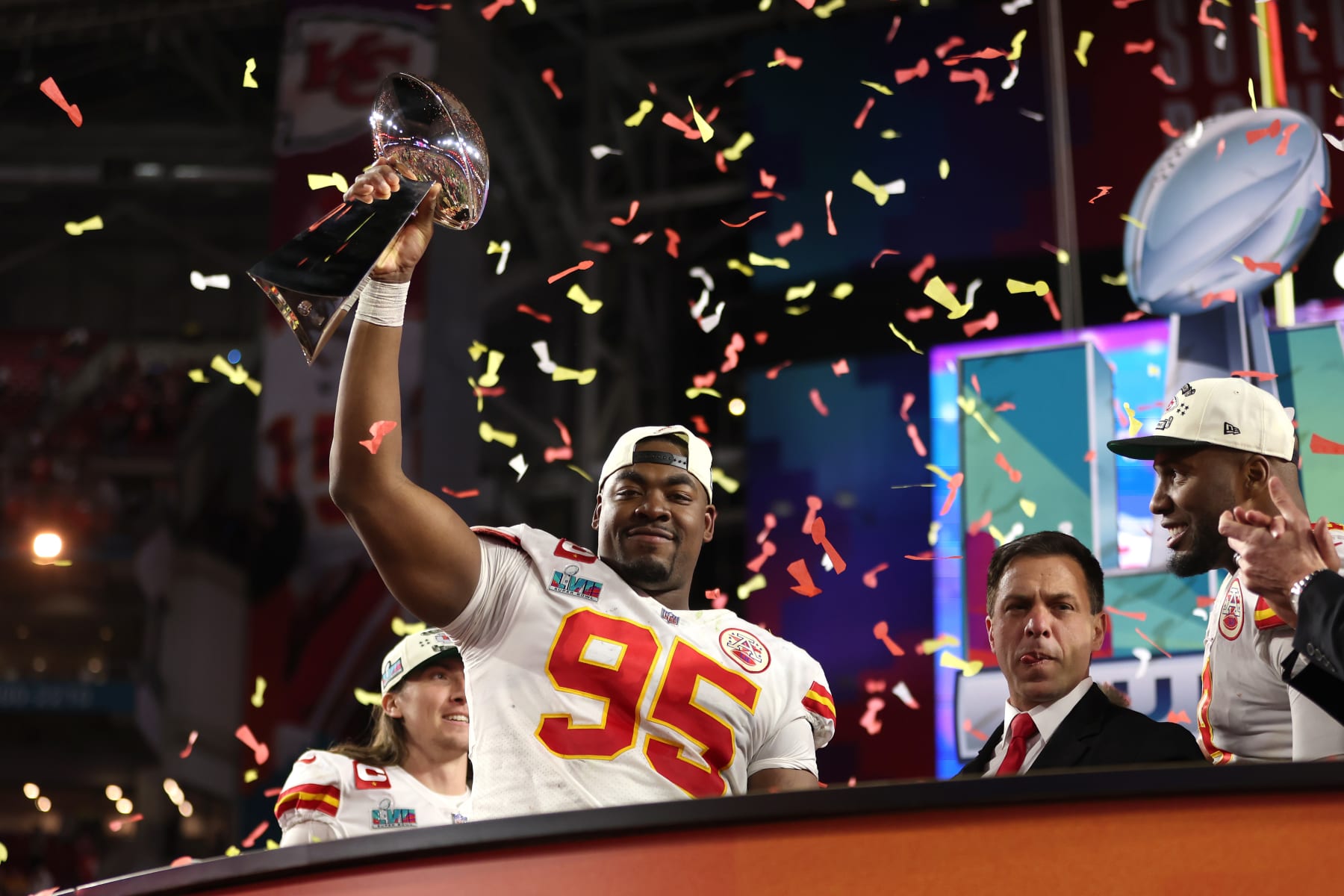 GLENDALE, ARIZONA - FEBRUARY 12: Chris Jones #95 of the Kansas City Chiefs celebrates with the the Vince Lombardi Trophy after defeating the Philadelphia Eagles 38-35 in Super Bowl LVII at State Farm Stadium on February 12, 2023 in Glendale, Arizona. (Photo by Gregory Shamus/Getty Images)
