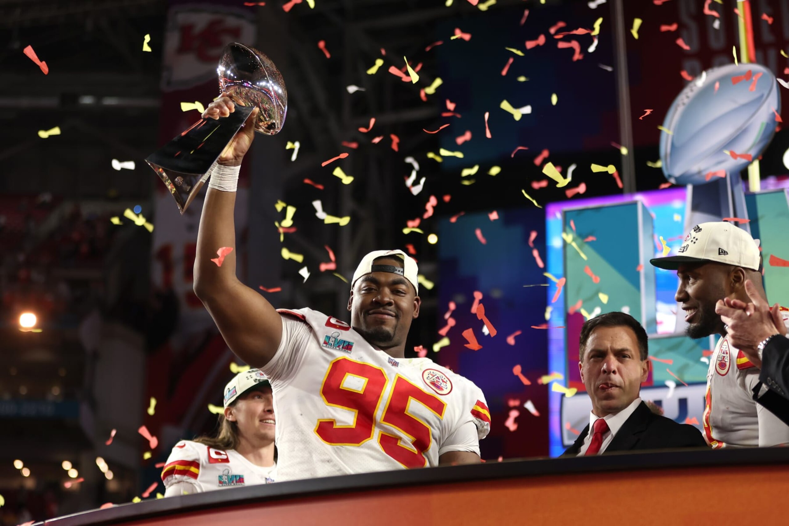 GLENDALE, ARIZONA - FEBRUARY 12: Chris Jones #95 of the Kansas City Chiefs celebrates with the the Vince Lombardi Trophy after defeating the Philadelphia Eagles 38-35 in Super Bowl LVII at State Farm Stadium on February 12, 2023 in Glendale, Arizona. (Photo by Gregory Shamus/Getty Images)