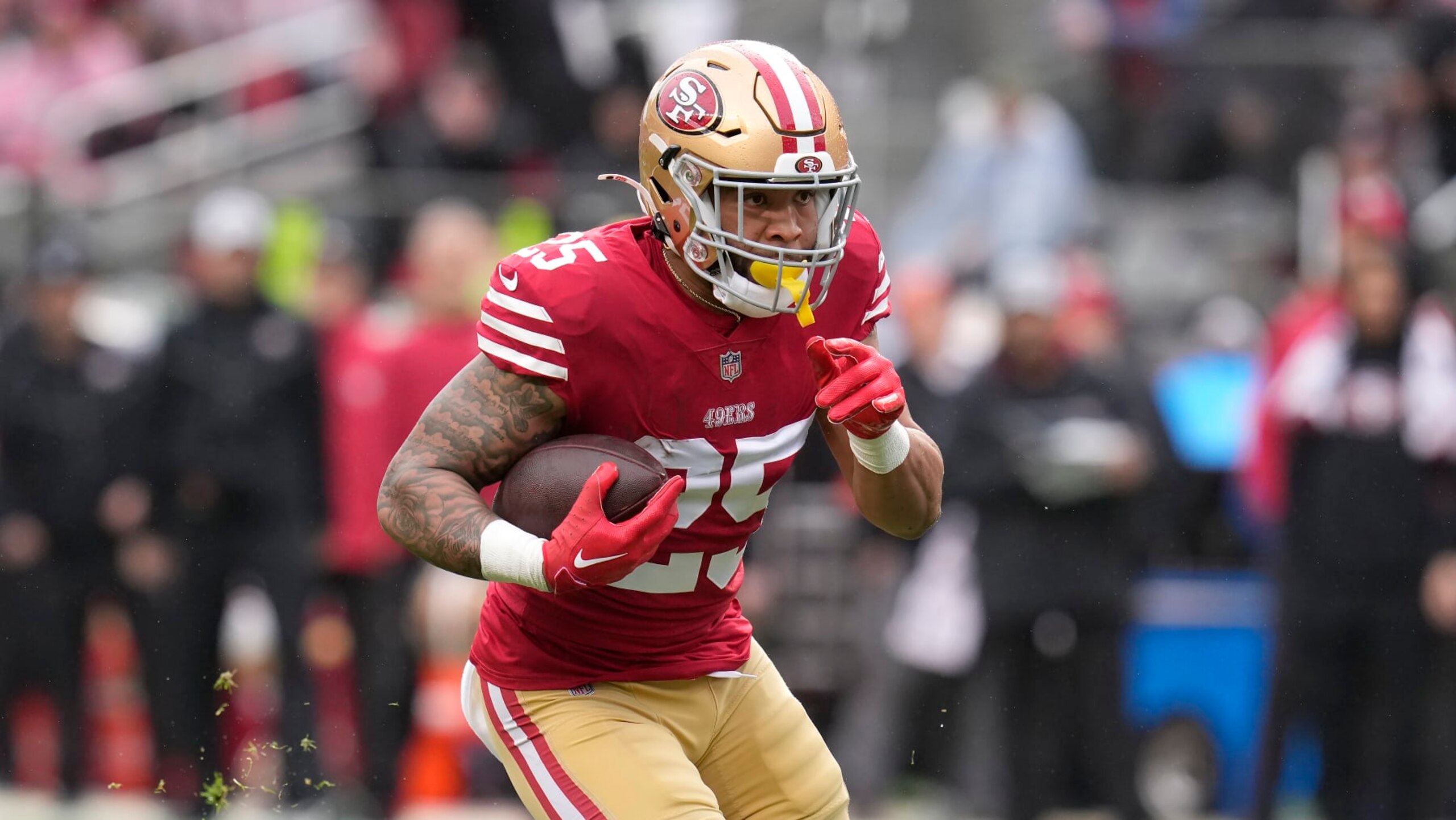 San Francisco 49ers running back Elijah Mitchell against the Seattle Seahawks during an NFL wild card playoff football game in Santa Clara, Calif., Saturday, Jan. 14, 2023. (AP Photo/Godofredo A. Vásquez)