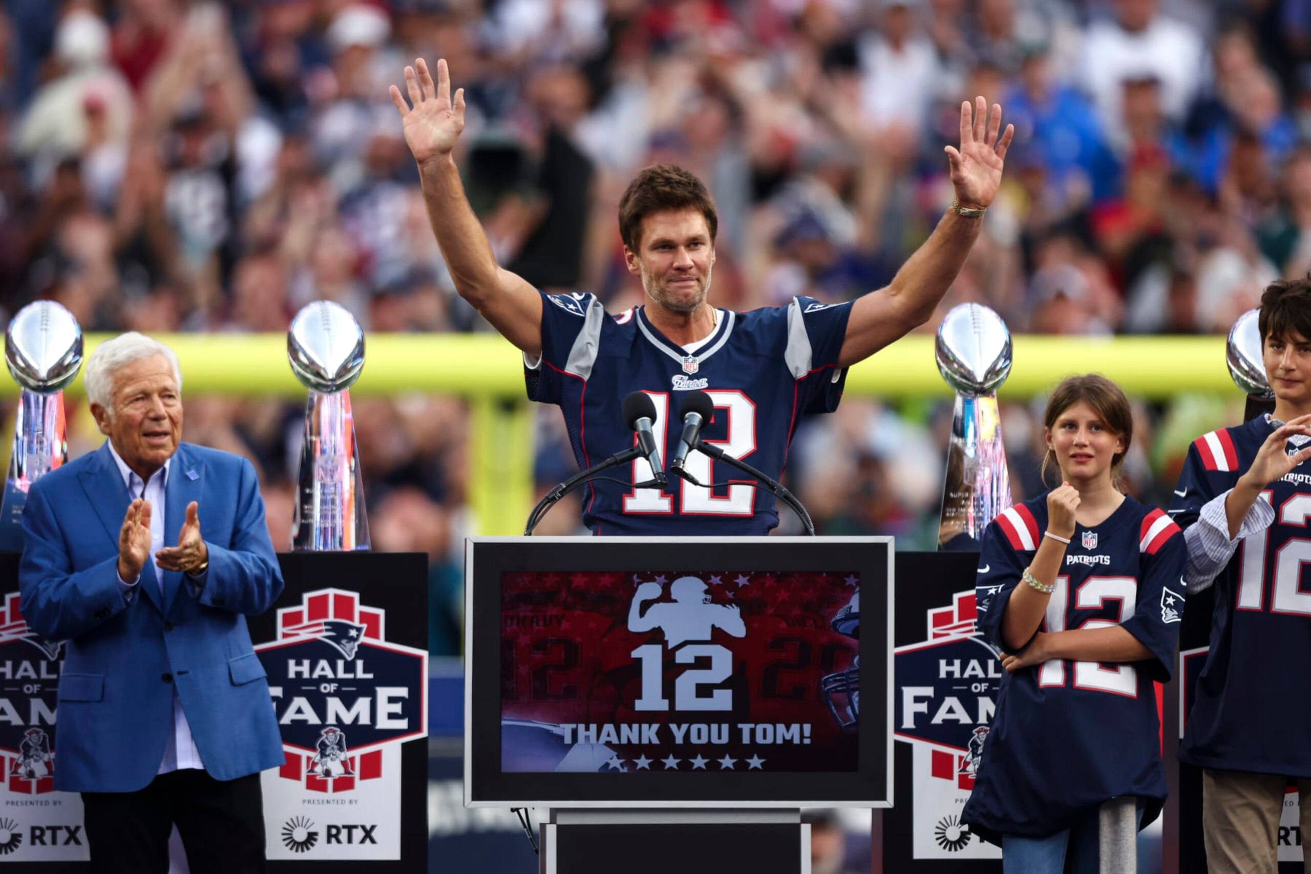FOXBOROUGH, MA - SEPTEMBER 10: Former quarterback Tom Brady gives a speech while being honored by the New England Patriots at halftime of an NFL football game between the New England Patriots and the Philadelphia Eagles at Gillette Stadium on September 10, 2023 in Foxborough, Massachusetts. (Photo by Kevin Sabitus/Getty Images)