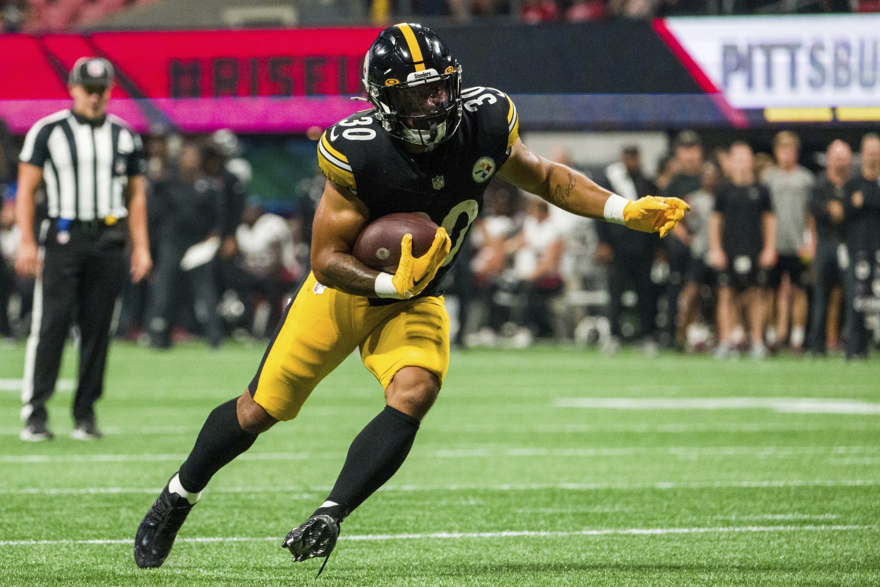 Pittsburgh Steelers running back Jaylen Warren (30) runs towards the end zone for a touchdown during the first half of an NFL preseason football game against the Atlanta Falcons, Thursday, Aug. 24, 2023, in Atlanta. The Pittsburgh Steelers won 24-0. (AP Photo/Danny Karnik)