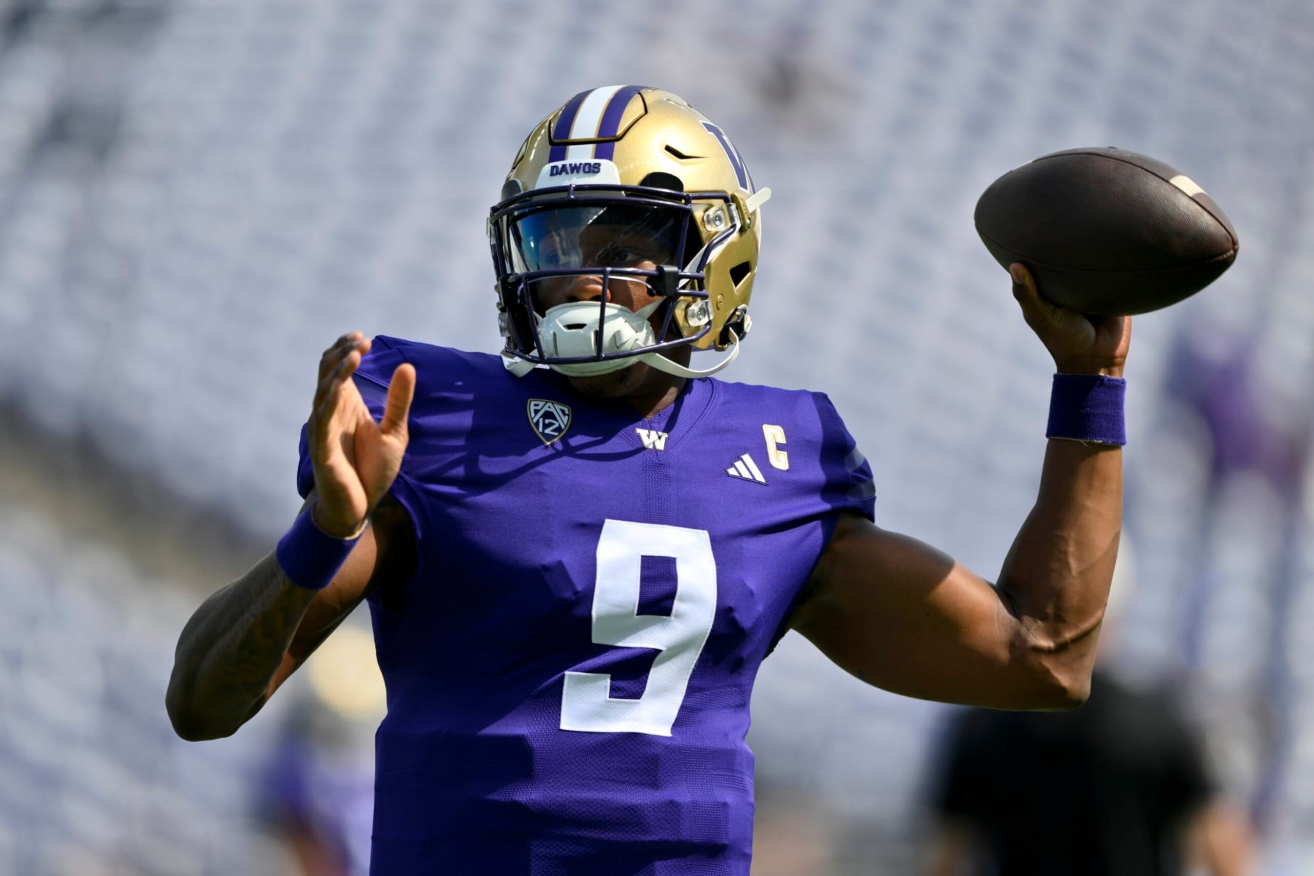 SEATTLE, WASHINGTON - SEPTEMBER 02: Michael Penix Jr. #9 of the Washington Huskies warms up before the game against the Boise State Broncos at Husky Stadium on September 02, 2023 in Seattle, Washington. (Photo by Alika Jenner/Getty Images)