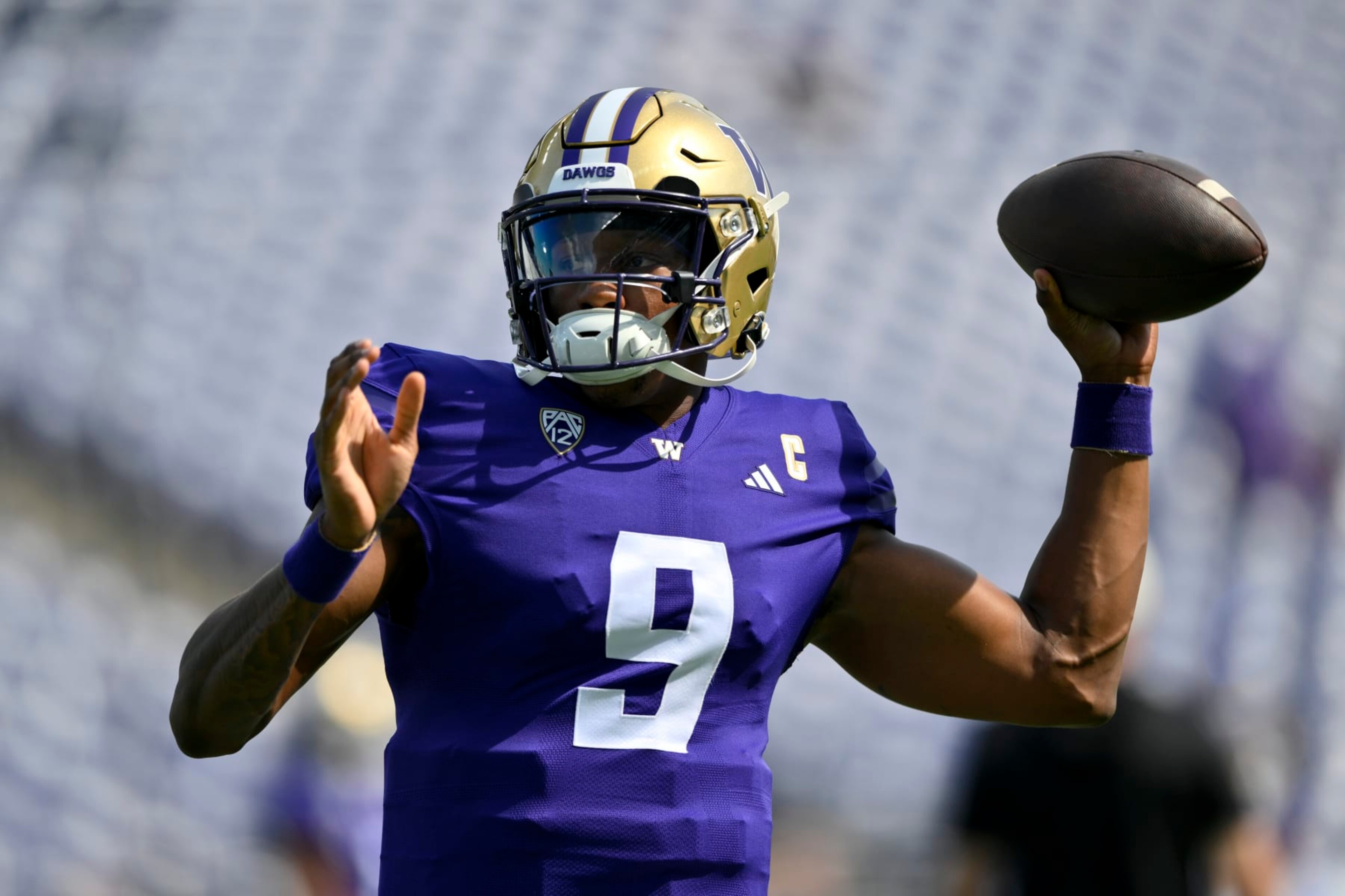 SEATTLE, WASHINGTON - SEPTEMBER 02: Michael Penix Jr. #9 of the Washington Huskies warms up before the game against the Boise State Broncos at Husky Stadium on September 02, 2023 in Seattle, Washington. (Photo by Alika Jenner/Getty Images)