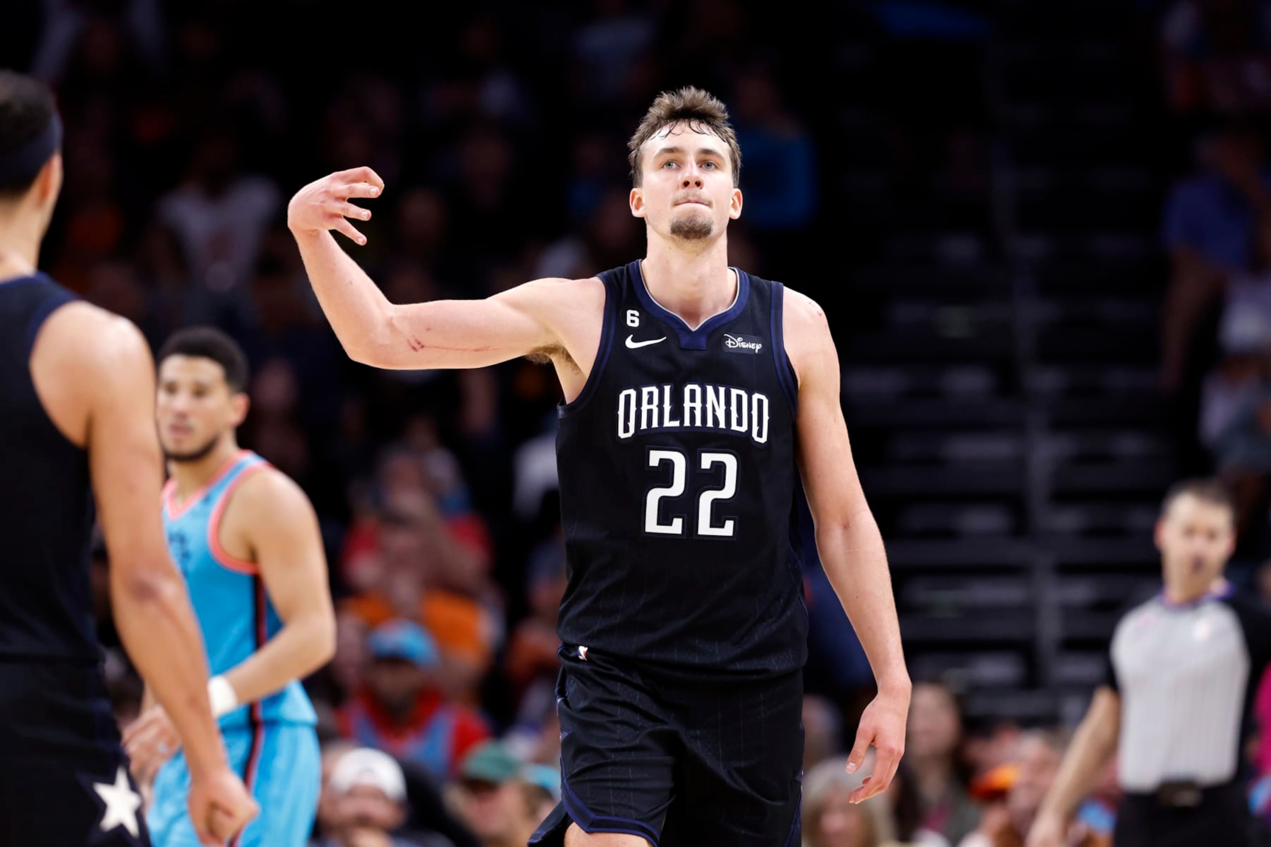 PHOENIX, ARIZONA - MARCH 16: Franz Wagner #22 of the Orlando Magic reacts to a basket during the game against the Phoenix Suns at Footprint Center on March 16, 2023 in Phoenix, Arizona. The Suns beat the Magic 116-113. NOTE TO USER: User expressly acknowledges and agrees that, by downloading and or using this photograph, User is consenting to the terms and conditions of the Getty Images License Agreement.  (Photo by Chris Coduto/Getty Images)