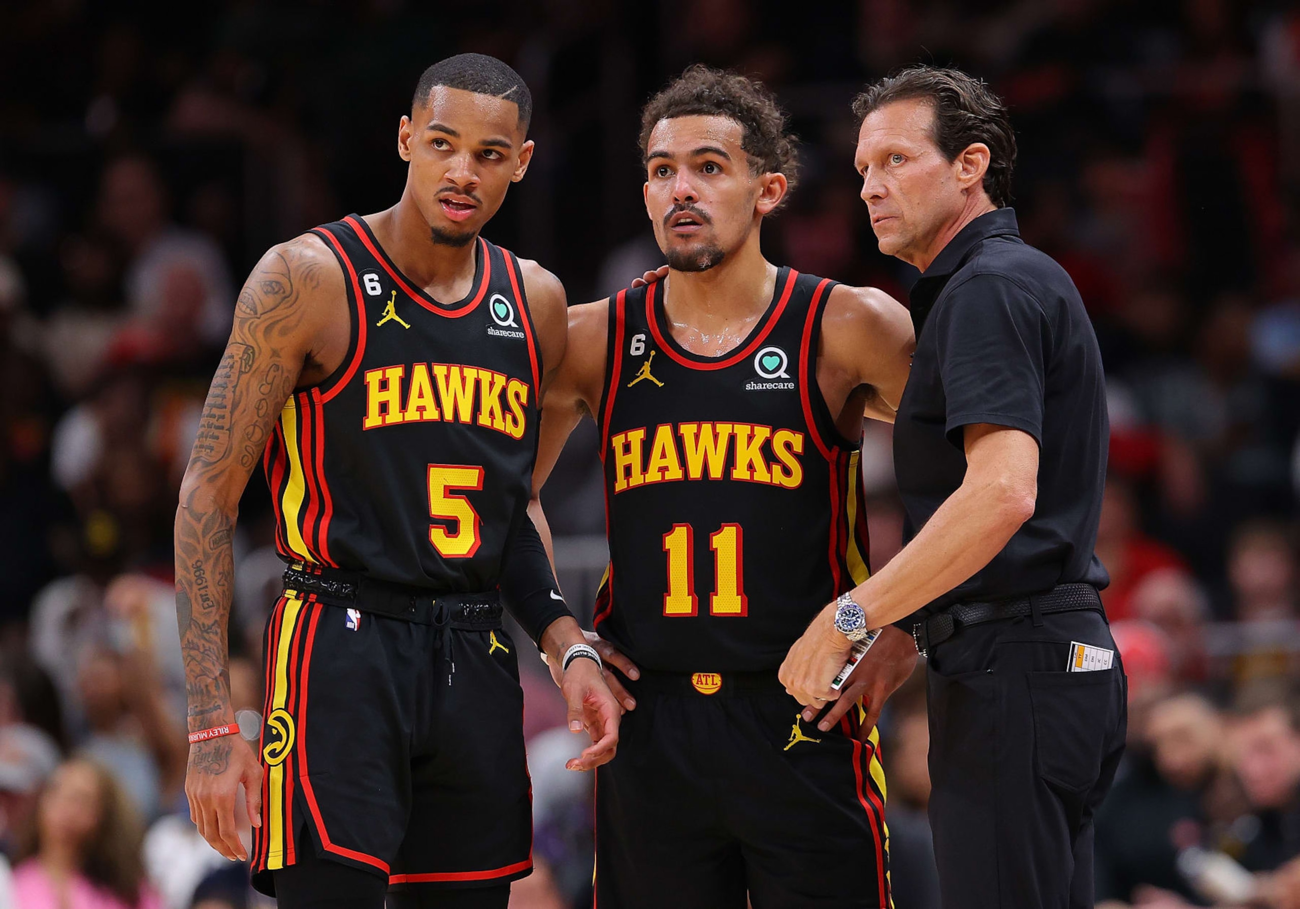 Dejounte Murray, Trae Young and Quin Snyder