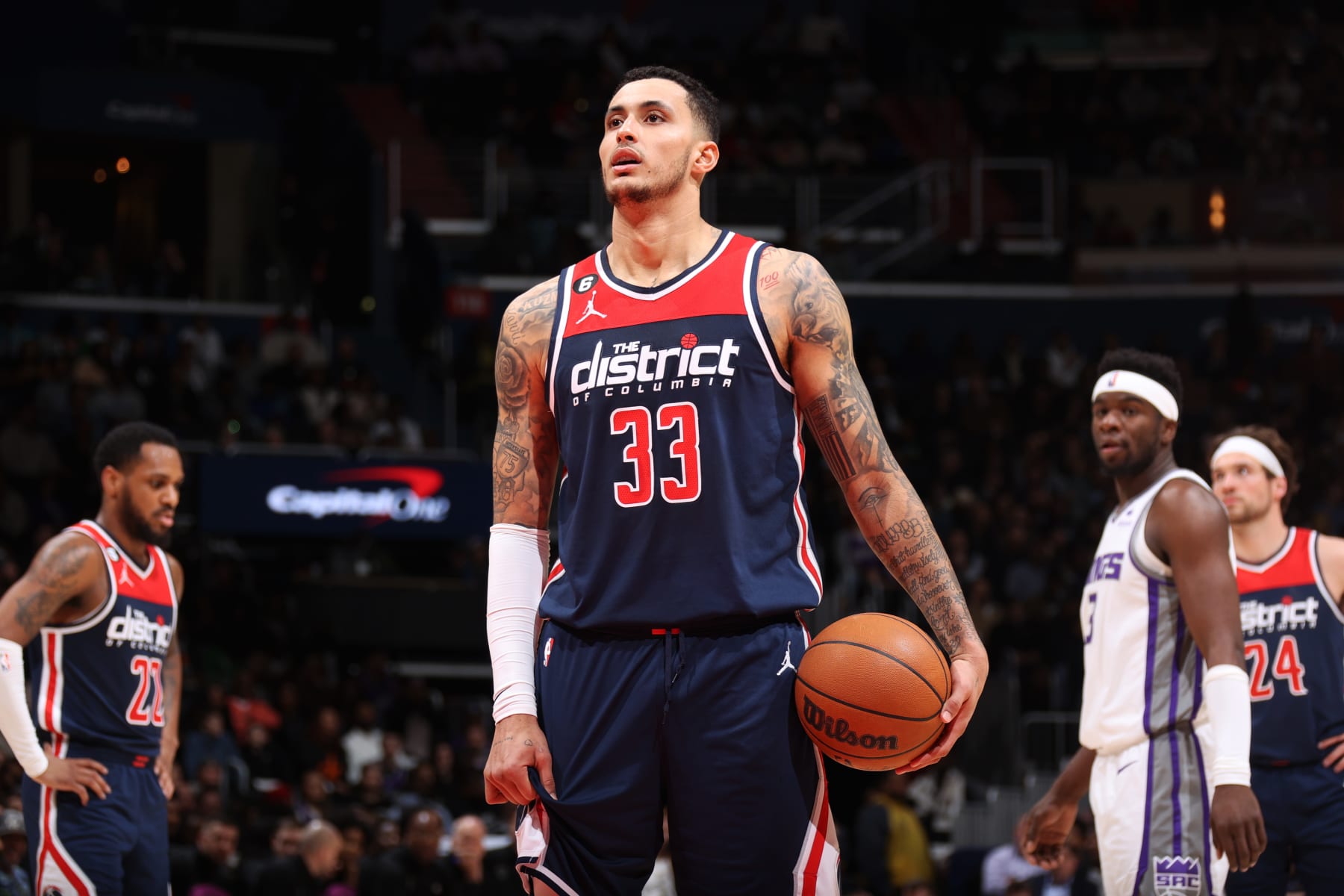 WASHINGTON, DC -  MARCH 18: Kyle Kuzma #33 of the Washington Wizards shoots a free throw during the game against the Sacramento Kings on March 18, 2023 at Capital One Arena in Washington, DC. NOTE TO USER: User expressly acknowledges and agrees that, by downloading and or using this Photograph, user is consenting to the terms and conditions of the Getty Images License Agreement. Mandatory Copyright Notice: Copyright 2023 NBAE (Photo by Stephen Gosling/NBAE via Getty Images)