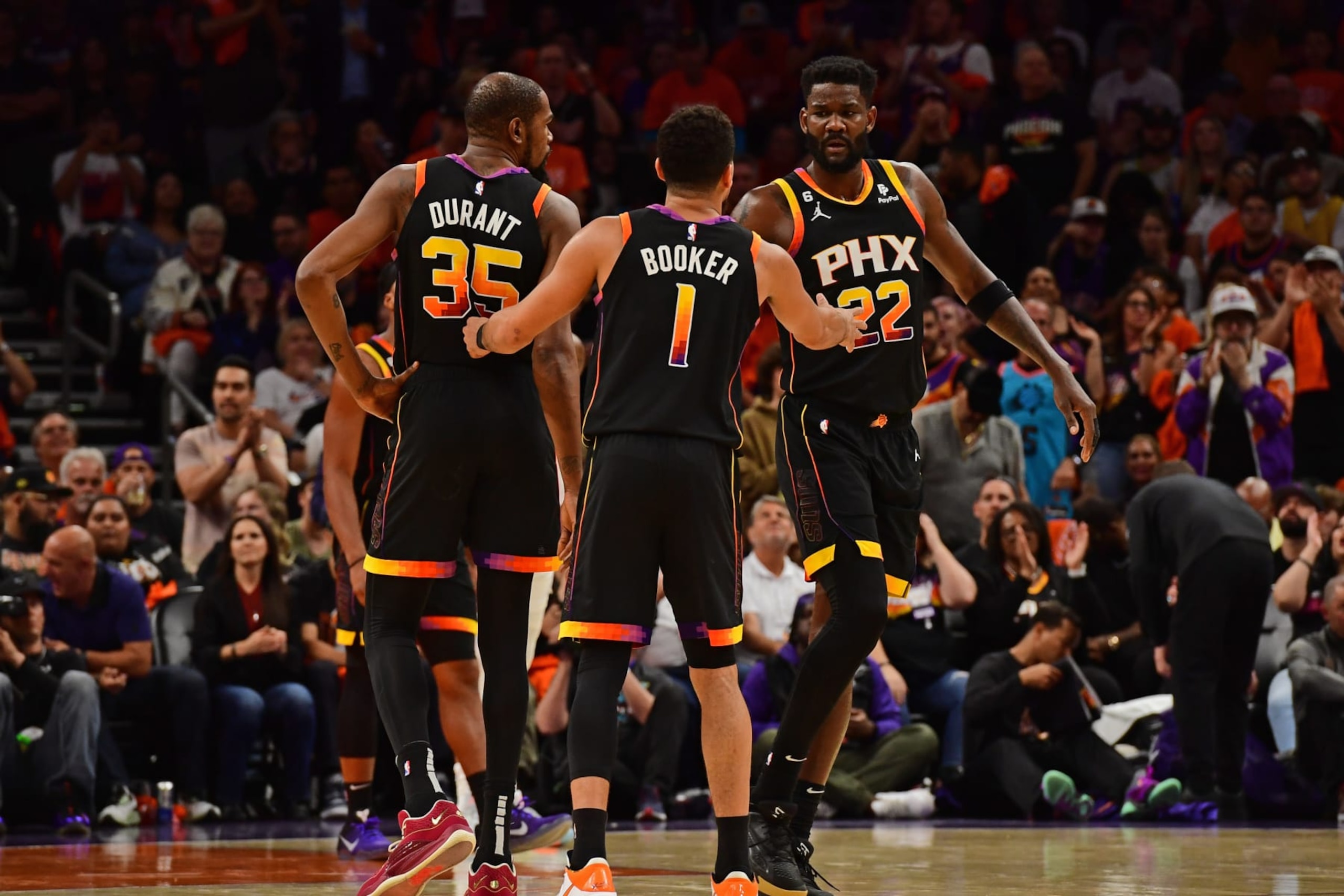 Kevin Durant, Devin Booker and Deandre Ayton