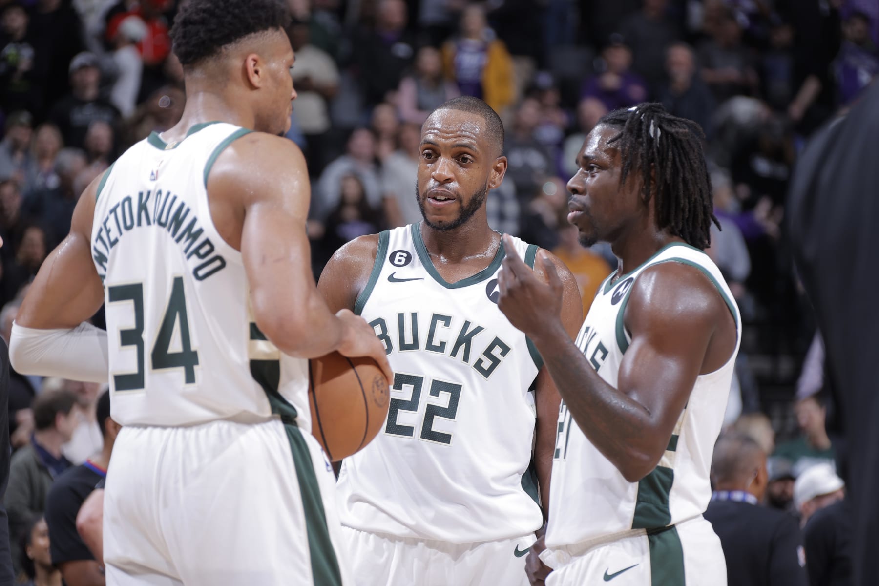Giannis Antetokounmpo, Khris Middleton and Jrue Holiday