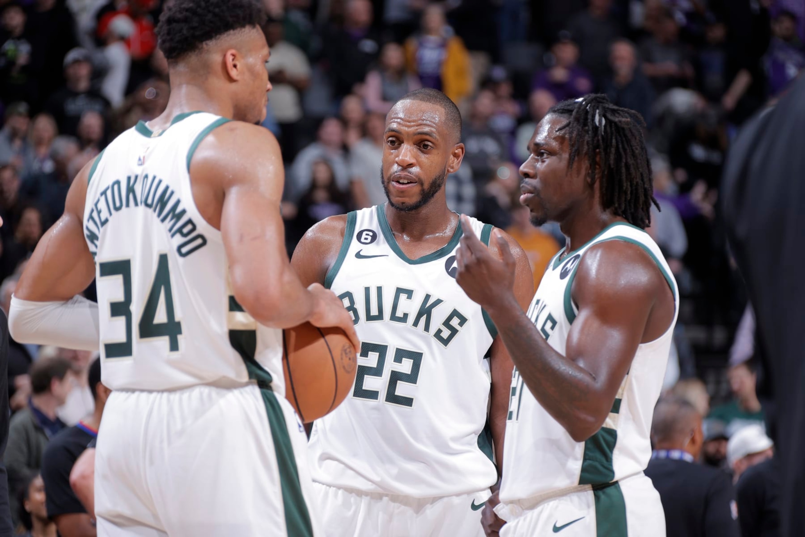 Giannis Antetokounmpo, Khris Middleton and Jrue Holiday