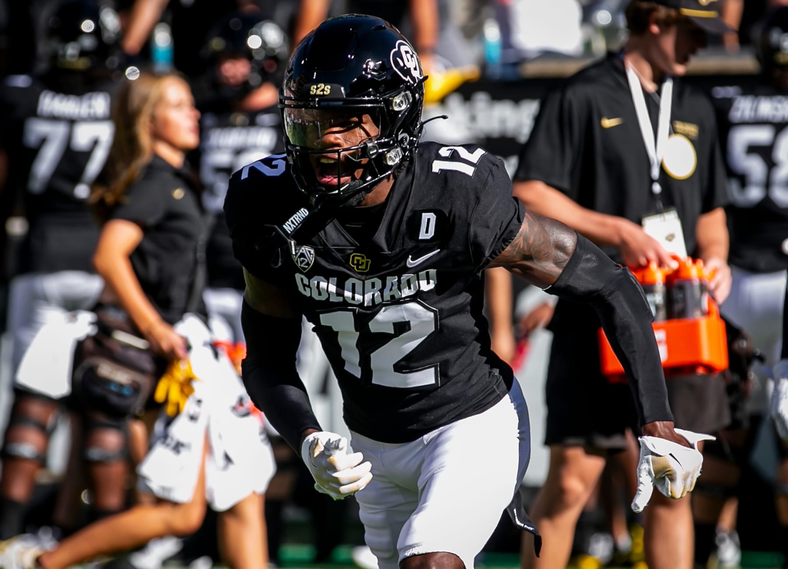 BOULDER, CO - SEPTEMBER 09: Colorado cornerback Travis Hunter (12) runs routes during warmups prior to the home opener game between the Colorado Buffaloes and the the Nebraska Cornhuskers on Saturday, September 9, 2023 at Folsom Field in Boulder, CO.  (Photo by Nick Tre. Smith/Icon Sportswire via Getty Images)