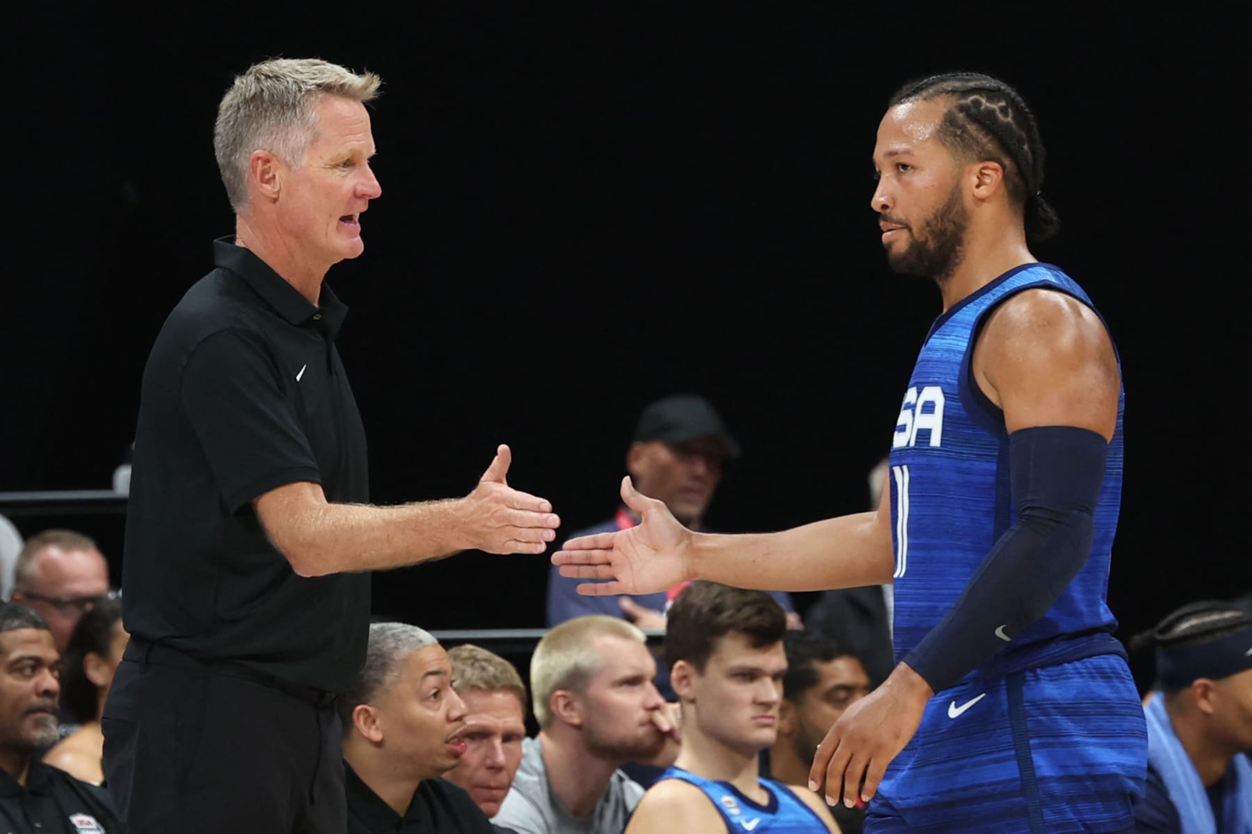 USA's coach Steve Kerr (L) greets USA's Jalen Brunson during the Basketball Showcase friendly match between the USA and Greece at the Etihad Arena in Abu Dhabi on August 18, 2023. (Photo by Giuseppe CACACE / AFP) (Photo by GIUSEPPE CACACE/AFP via Getty Images)