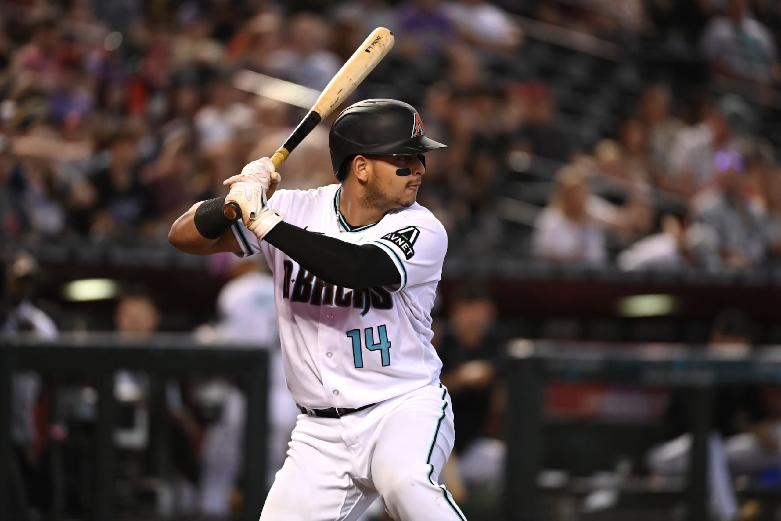 PHOENIX, ARIZONA - SEPTEMBER 04: Gabriel Moreno #14 of the Arizona Diamondbacks gets ready in the batters box against the Colorado Rockies at Chase Field on September 04, 2023 in Phoenix, Arizona. (Photo by Norm Hall/Getty Images)