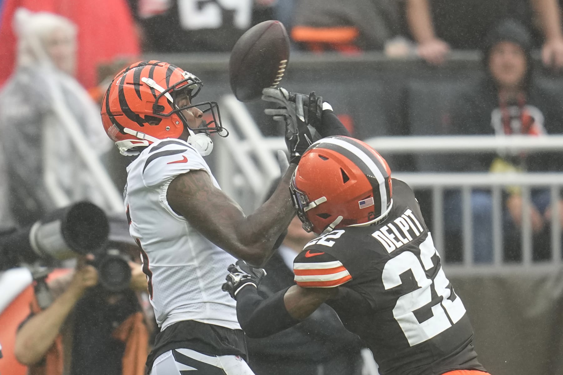 Cleveland Browns safety Grant Delpit (22) breaks up a pass intended for Cincinnati Bengals wide receiver Tee Higgins, left, during the second half of an NFL football game Sunday, Sept. 10, 2023, in Cleveland. (AP Photo/Sue Ogrocki)