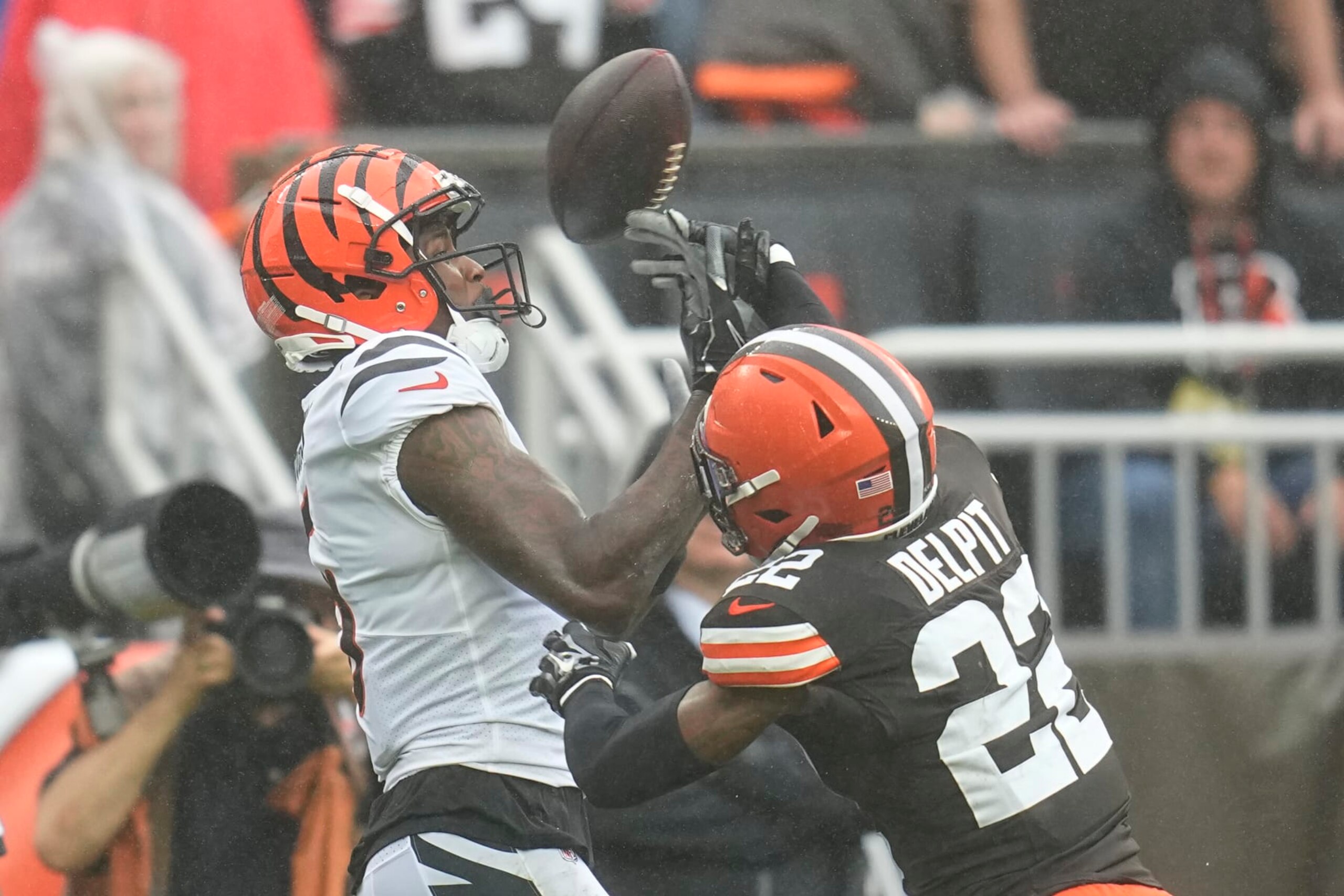 Cleveland Browns safety Grant Delpit (22) breaks up a pass intended for Cincinnati Bengals wide receiver Tee Higgins, left, during the second half of an NFL football game Sunday, Sept. 10, 2023, in Cleveland. (AP Photo/Sue Ogrocki)