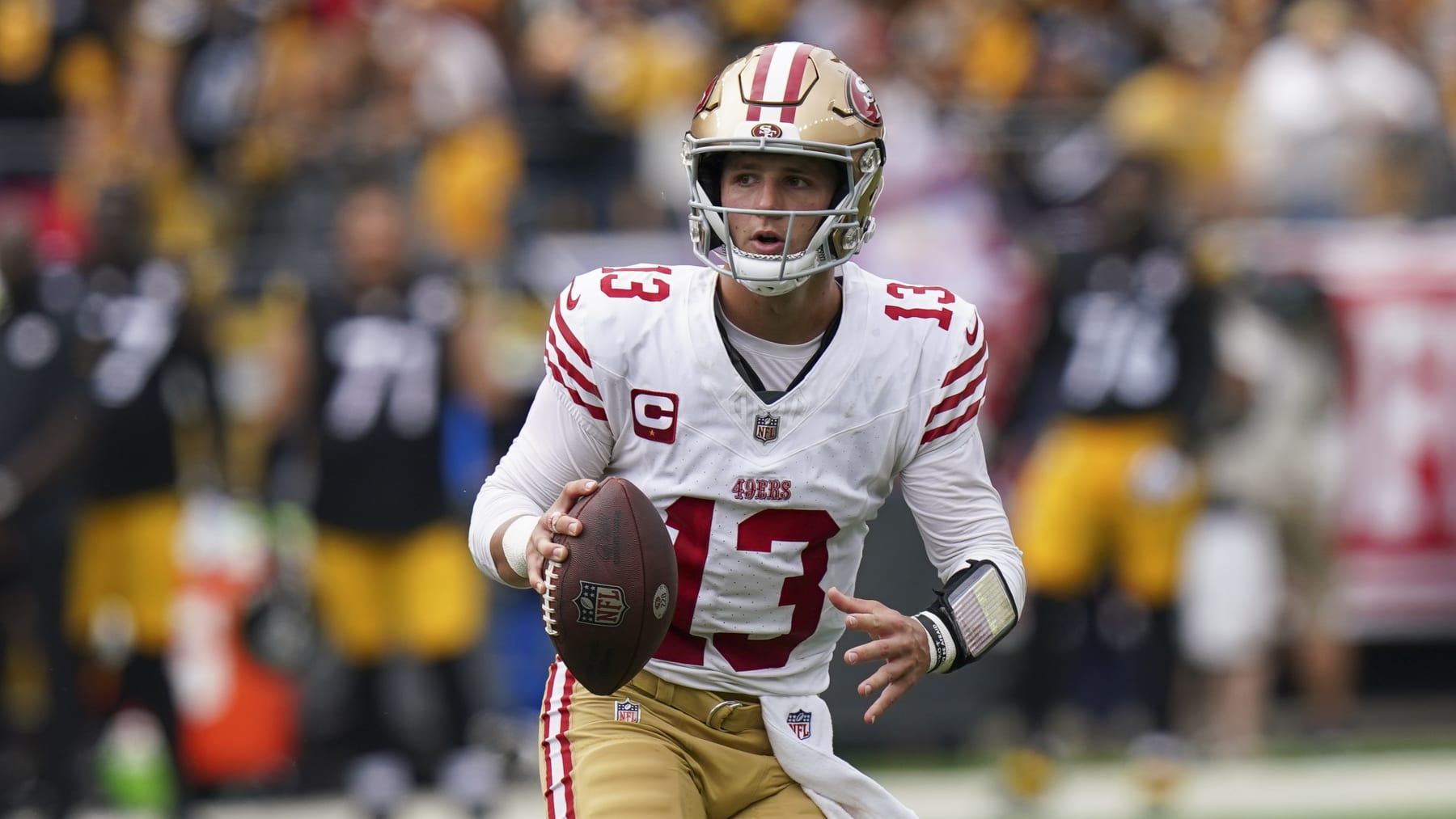 San Francisco 49ers quarterback Brock Purdy looks for a receiver against the Pittsburgh Steelers during the first half of an NFL football game Sunday, Sept. 10, 2023, in Pittsburgh. (AP Photo/Matt Freed)