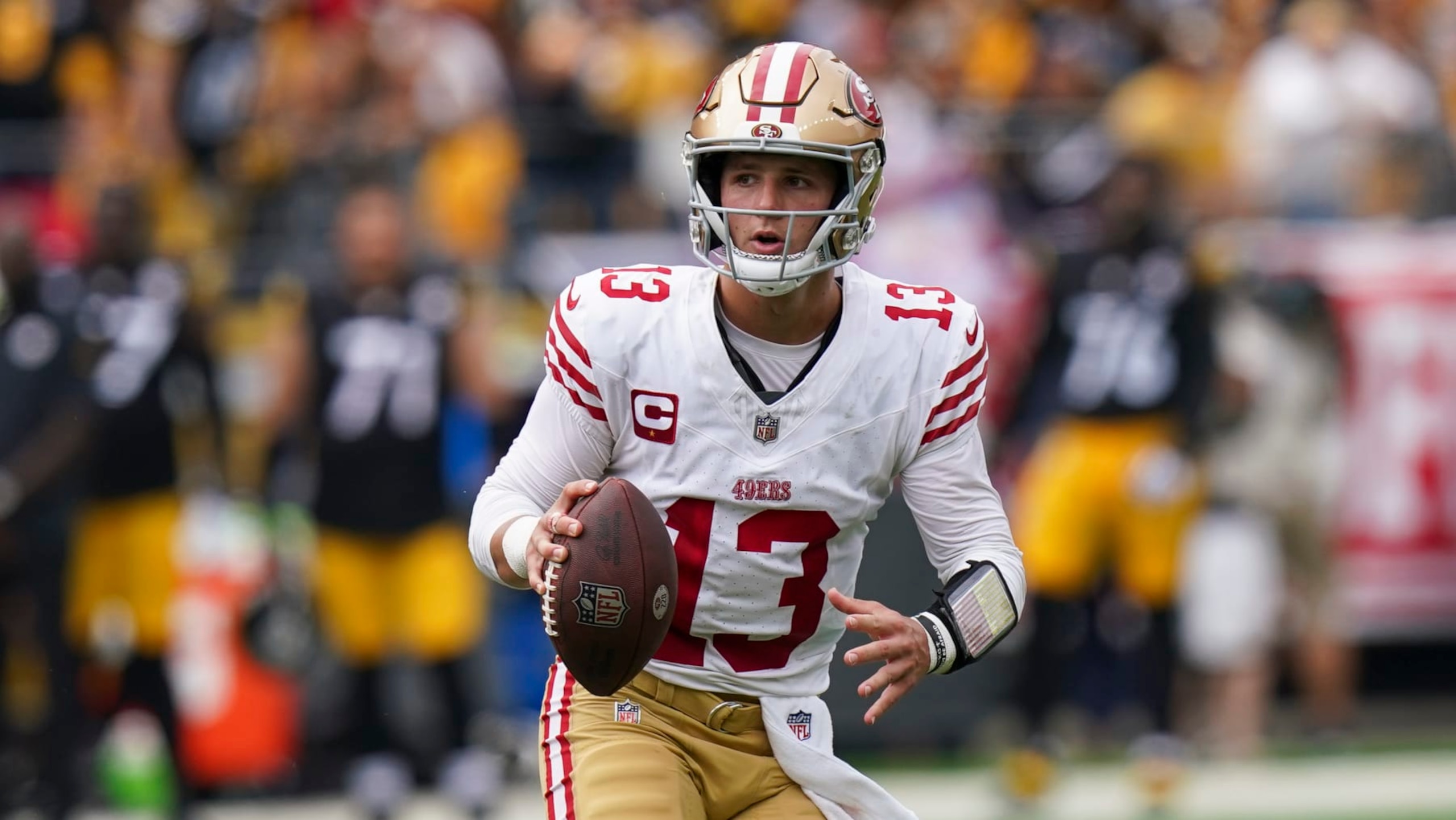 San Francisco 49ers quarterback Brock Purdy looks for a receiver against the Pittsburgh Steelers during the first half of an NFL football game Sunday, Sept. 10, 2023, in Pittsburgh. (AP Photo/Matt Freed)