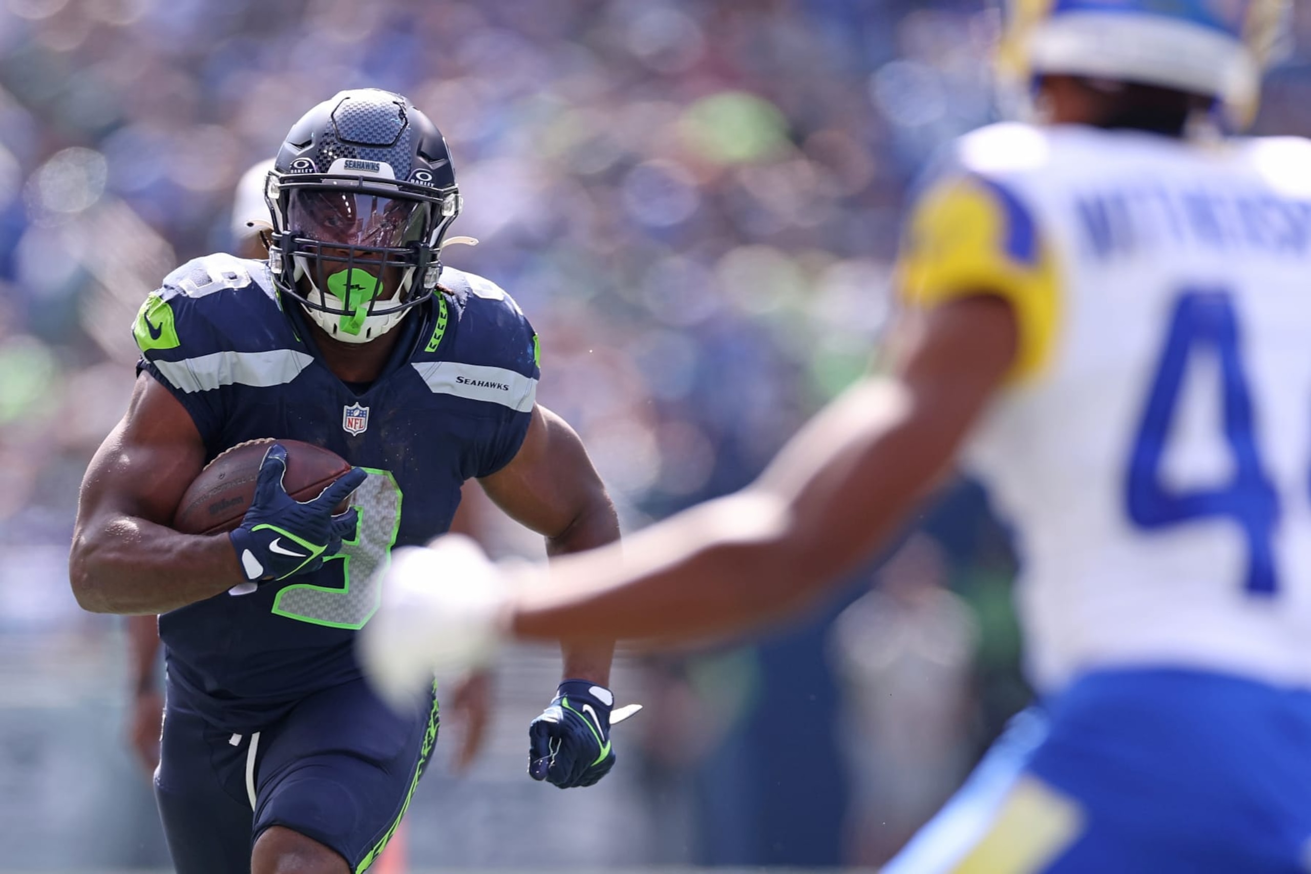 SEATTLE, WASHINGTON - SEPTEMBER 10: Kenneth Walker III #9 of the Seattle Seahawks runs the ball against the Los Angeles Rams during the first half at Lumen Field on September 10, 2023 in Seattle, Washington. (Photo by Steph Chambers/Getty Images) SEATTLE, WASHINGTON - SEPTEMBER 10: Kenneth Walker III #9 of the Seattle Seahawks runs the ball against the Los Angeles Rams during the first half at Lumen Field on September 10, 2023 in Seattle, Washington. (Photo by Steph Chambers/Getty Images)