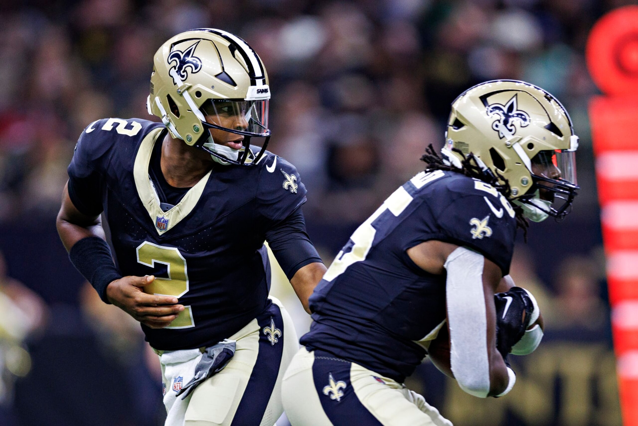 NEW ORLEANS, LOUISIANA - AUGUST 27: Jameis Winston #2 hands off the ball to Kendre Miller #25 of the New Orleans Saints during the preseason game against the Houston Texans at Caesars Superdome on August 27, 2023 in New Orleans, Louisiana. The Texans defeated the Saints 17-13. (Photo by Wesley Hitt/Getty Images) NEW ORLEANS, LOUISIANA - AUGUST 27: Jameis Winston #2 hands off the ball to Kendre Miller #25 of the New Orleans Saints during the preseason game against the Houston Texans at Caesars Superdome on August 27, 2023 in New Orleans, Louisiana. The Texans defeated the Saints 17-13. (Photo by Wesley Hitt/Getty Images)