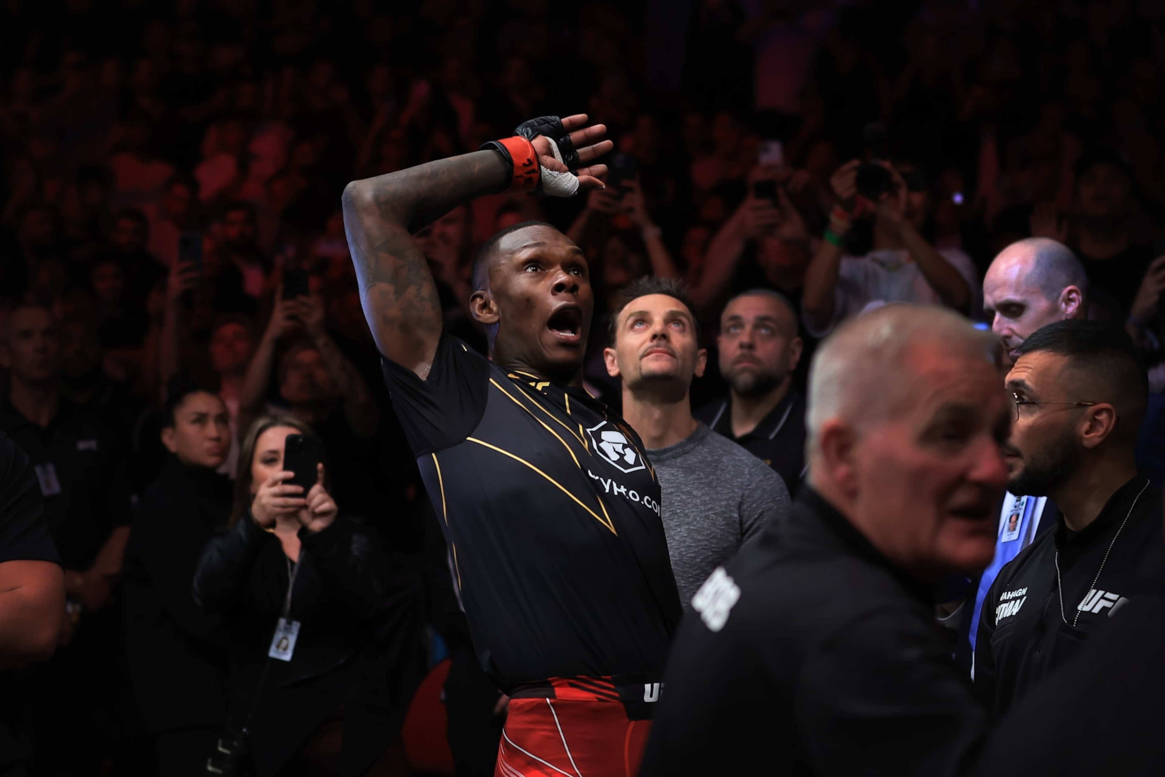 SYDNEY, AUSTRALIA - SEPTEMBER 10: Israel Adesanya of Nigeria arrives at the Octagon for his fight against Sean Strickland of United States during the UFC 293 event at Qudos Bank Arena on September 10, 2023 in Sydney, Australia. (Photo by Mark Evans/Getty Images) SYDNEY, AUSTRALIA - SEPTEMBER 10: Israel Adesanya of Nigeria arrives at the Octagon for his fight against Sean Strickland of United States during the UFC 293 event at Qudos Bank Arena on September 10, 2023 in Sydney, Australia. (Photo by Mark Evans/Getty Images)