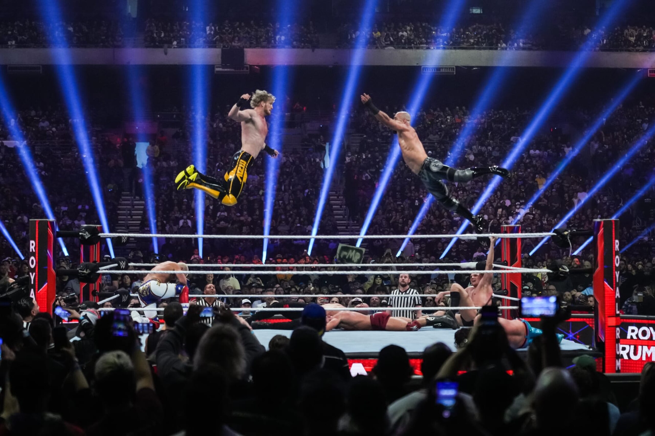 SAN ANTONIO, TEXAS - JANUARY 28: Logan Paul and Ricochet wrestle during the WWE Royal Rumble at the Alamodome on January 28, 2023 in San Antonio, Texas. (Photo by Alex Bierens de Haan/Getty Images)