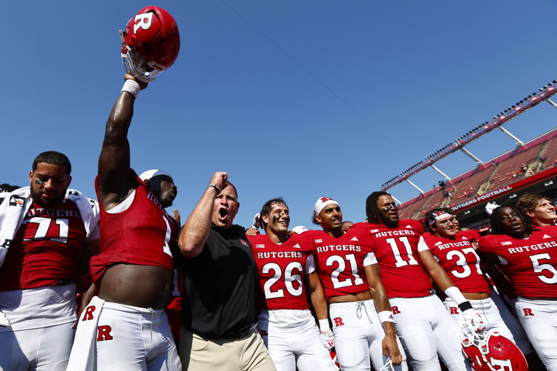 PISCATAWAY, NEW JERSEY - SEPTEMBER 3: Head coach Greg Schiano of the Rutgers Scarlet Knights celebrates with his team after a 24-7 victory over the Northwestern Wildcats in a college football game at SHI Stadium on September 3, 2023 in Piscataway, New Jersey. (Photo by Rich Schultz/Getty Images)