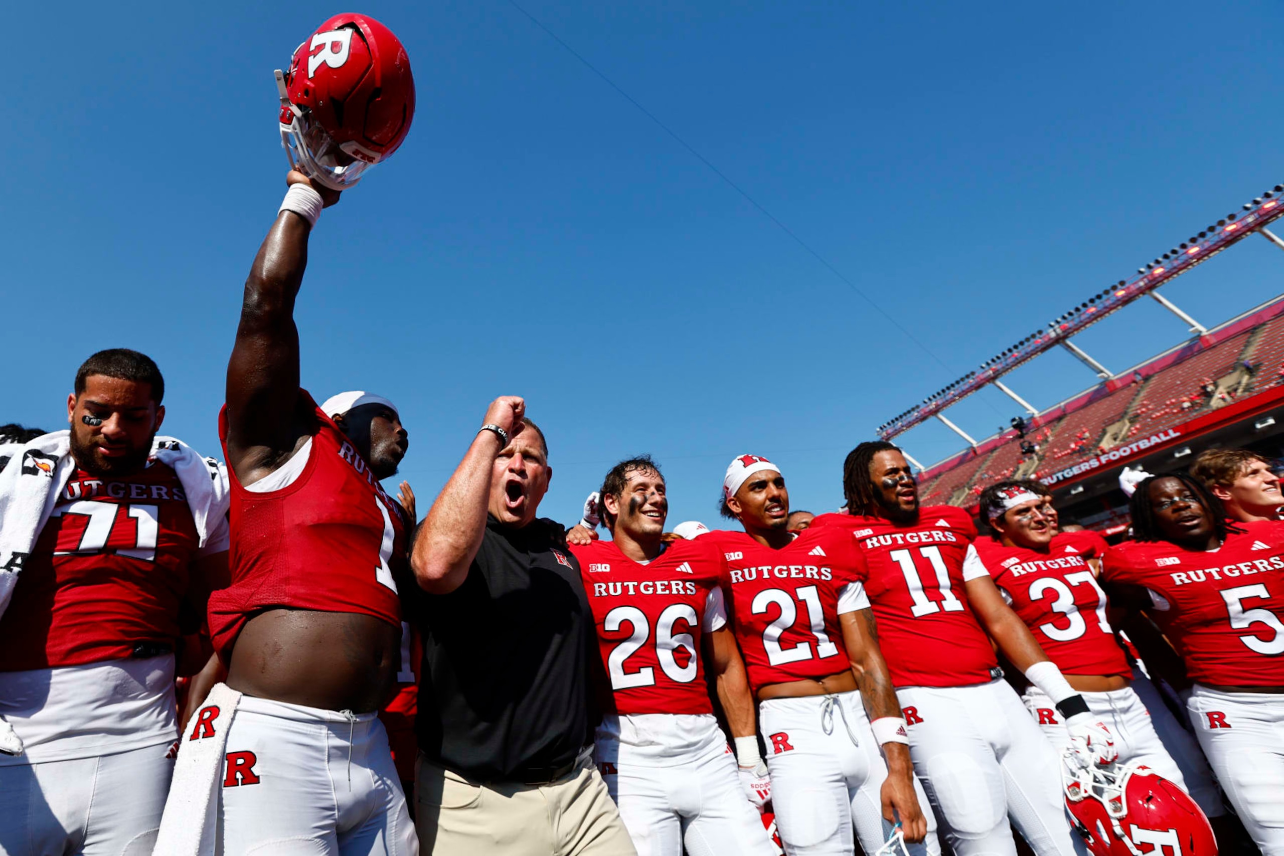 PISCATAWAY, NEW JERSEY - SEPTEMBER 3: Head coach Greg Schiano of the Rutgers Scarlet Knights celebrates with his team after a 24-7 victory over the Northwestern Wildcats in a college football game at SHI Stadium on September 3, 2023 in Piscataway, New Jersey. (Photo by Rich Schultz/Getty Images) PISCATAWAY, NEW JERSEY - SEPTEMBER 3: Head coach Greg Schiano of the Rutgers Scarlet Knights celebrates with his team after a 24-7 victory over the Northwestern Wildcats in a college football game at SHI Stadium on September 3, 2023 in Piscataway, New Jersey. (Photo by Rich Schultz/Getty Images)