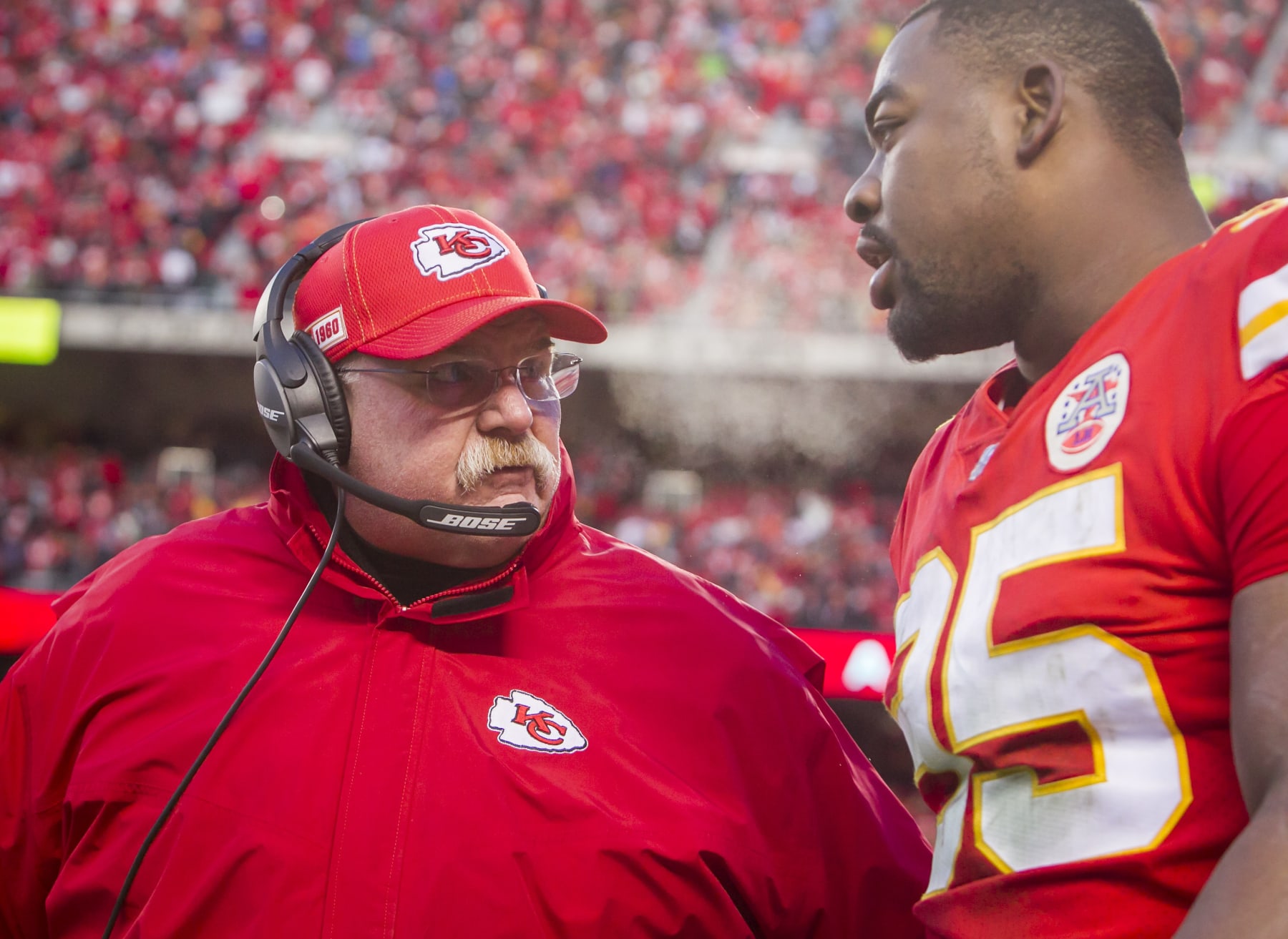 KANSAS CITY, MO - JANUARY 19: Kansas City Chiefs head coach Andy Reid talks to Kansas City Chiefs defensive end Chris Jones (95) on his way to the sideline during the AFC Championship game between the Tennessee Titans and the Kansas City Chiefs on Sunday January 19, 2020 at Arrowhead Stadium in Kansas City, MO.  (Photo by Nick Tre. Smith/Icon Sportswire via Getty Images)