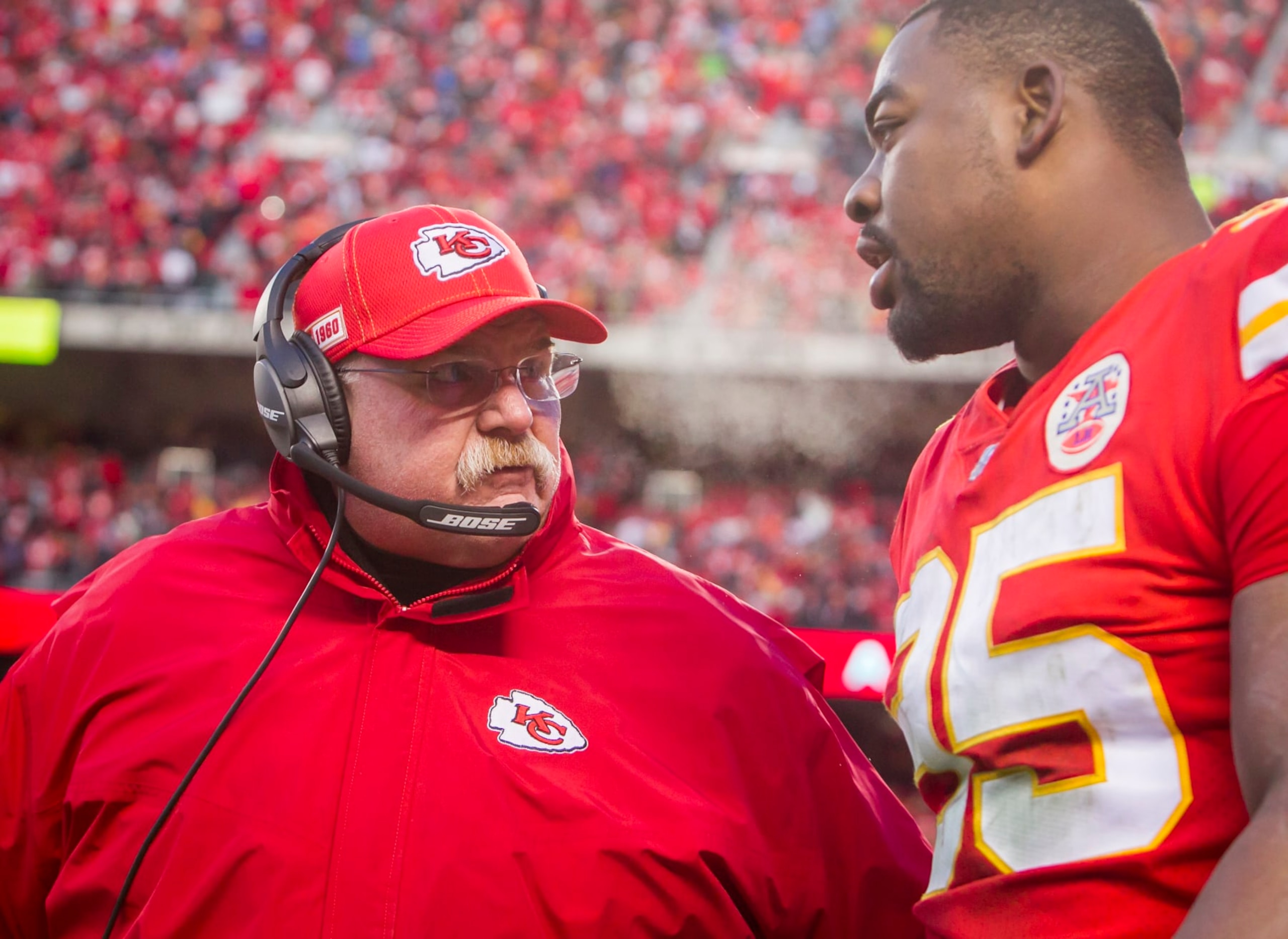 KANSAS CITY, MO - JANUARY 19: Kansas City Chiefs head coach Andy Reid talks to Kansas City Chiefs defensive end Chris Jones (95) on his way to the sideline during the AFC Championship game between the Tennessee Titans and the Kansas City Chiefs on Sunday January 19, 2020 at Arrowhead Stadium in Kansas City, MO.  (Photo by Nick Tre. Smith/Icon Sportswire via Getty Images)