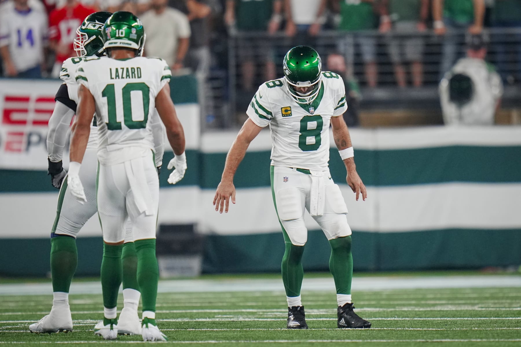 New York Jets quarterback Aaron Rodgers (8) limps on his ankle after a sack during an NFL football game against the Buffalo Bills on Monday, Sept. 11, 2023, in East Rutherford, N.J. (AP Photo/Rusty Jones)