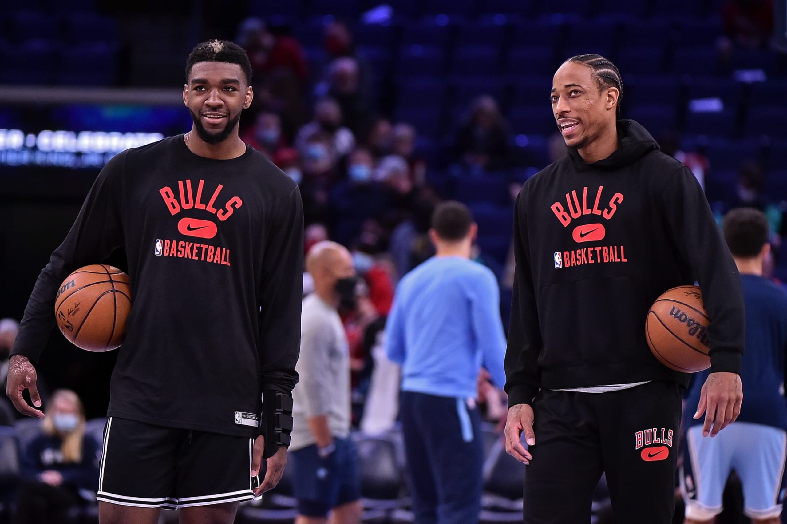 MEMPHIS, TENNESSEE - JANUARY 17: Patrick Williams #44 of the Chicago Bulls and DeMar DeRozan #11 of the Chicago Bulls before the game against the Memphis Grizzlies at FedExForum on January 17, 2022 in Memphis, Tennessee. NOTE TO USER: User expressly acknowledges and agrees that, by downloading and or using this photograph, User is consenting to the terms and conditions of the Getty Images License Agreement.  (Photo by Justin Ford/Getty Images)
