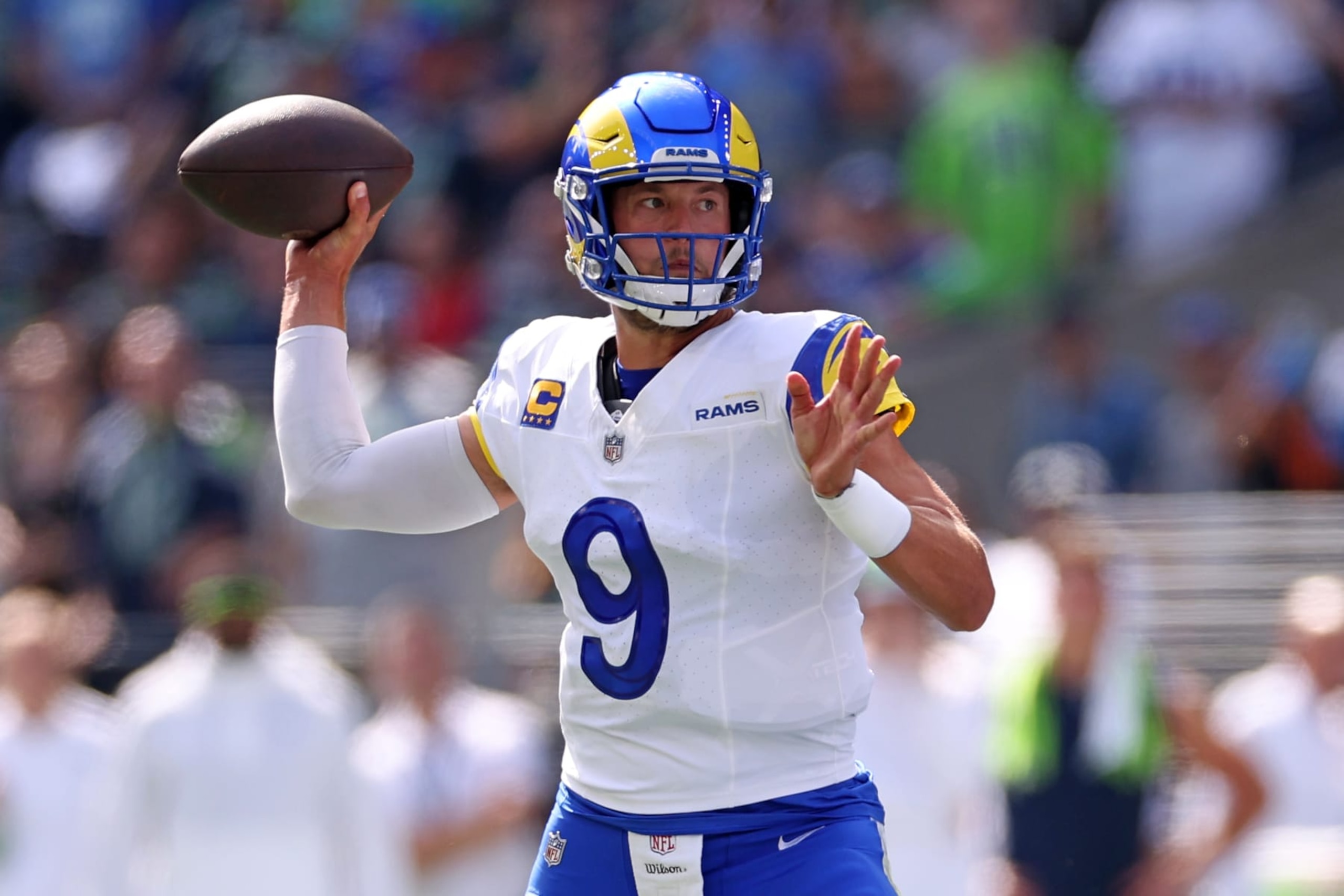 SEATTLE, WASHINGTON - SEPTEMBER 10:  Matthew Stafford #9 of the Los Angeles Rams attempts a pass against the Seattle Seahawks during the first half at Lumen Field on September 10, 2023 in Seattle, Washington. (Photo by Steph Chambers/Getty Images)