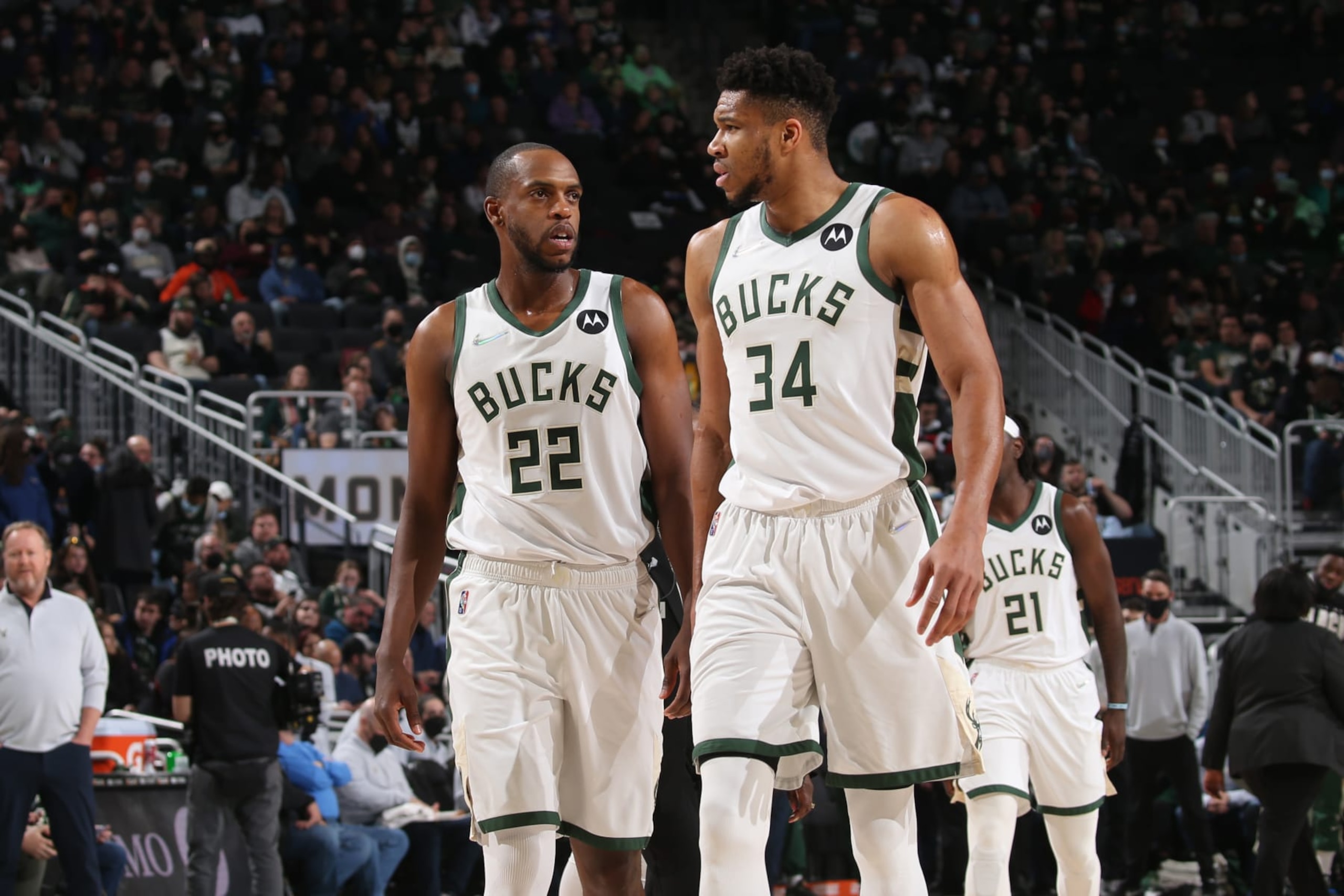 MILWAUKEE, WI - FEBRUARY 15: Khris Middleton #22 talks to Giannis Antetokounmpo #34 of the Milwaukee Bucks during the game against the Indiana Pacers on February 15, 2022 at the Fiserv Forum Center in Milwaukee, Wisconsin. NOTE TO USER: User expressly acknowledges and agrees that, by downloading and or using this Photograph, user is consenting to the terms and conditions of the Getty Images License Agreement. Mandatory Copyright Notice: Copyright 2022 NBAE (Photo by Gary Dineen/NBAE via Getty Images).