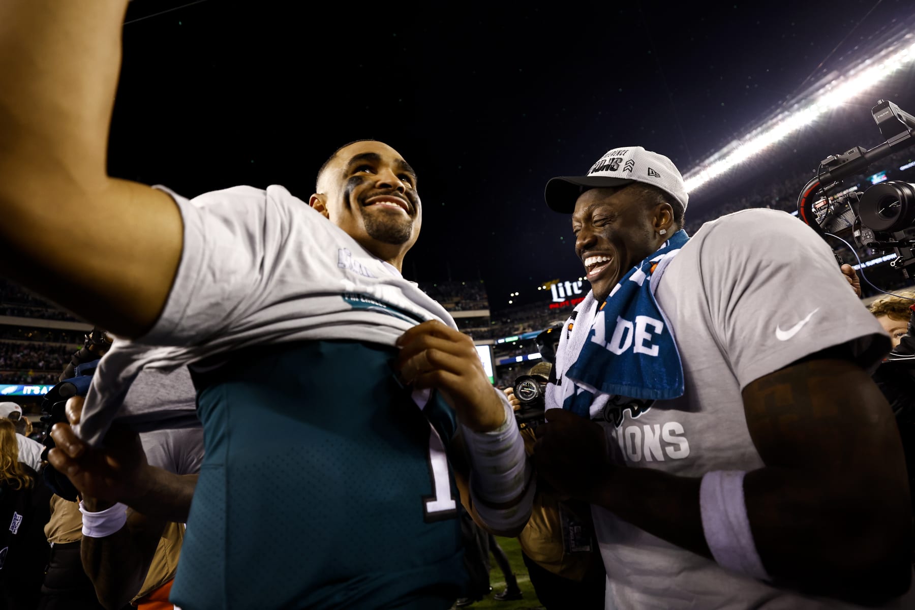 PHILADELPHIA, PA - JANUARY 29: Jalen Hurts #1 and A.J. Brown #11 of the Philadelphia Eagles smile on the field after the Philadelphia Eagles beat the San Francisco 49ers in the NFC Championship NFL football game at Lincoln Financial Field on January 29, 2023 in Philadelphia, Pennsylvania. (Photo by Kevin Sabitus/Getty Images)