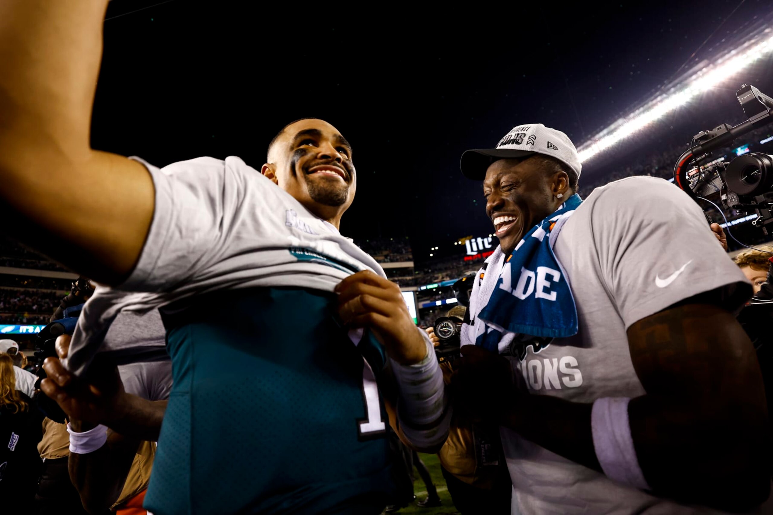 PHILADELPHIA, PA - JANUARY 29: Jalen Hurts #1 and A.J. Brown #11 of the Philadelphia Eagles smile on the field after the Philadelphia Eagles beat the San Francisco 49ers in the NFC Championship NFL football game at Lincoln Financial Field on January 29, 2023 in Philadelphia, Pennsylvania. (Photo by Kevin Sabitus/Getty Images)