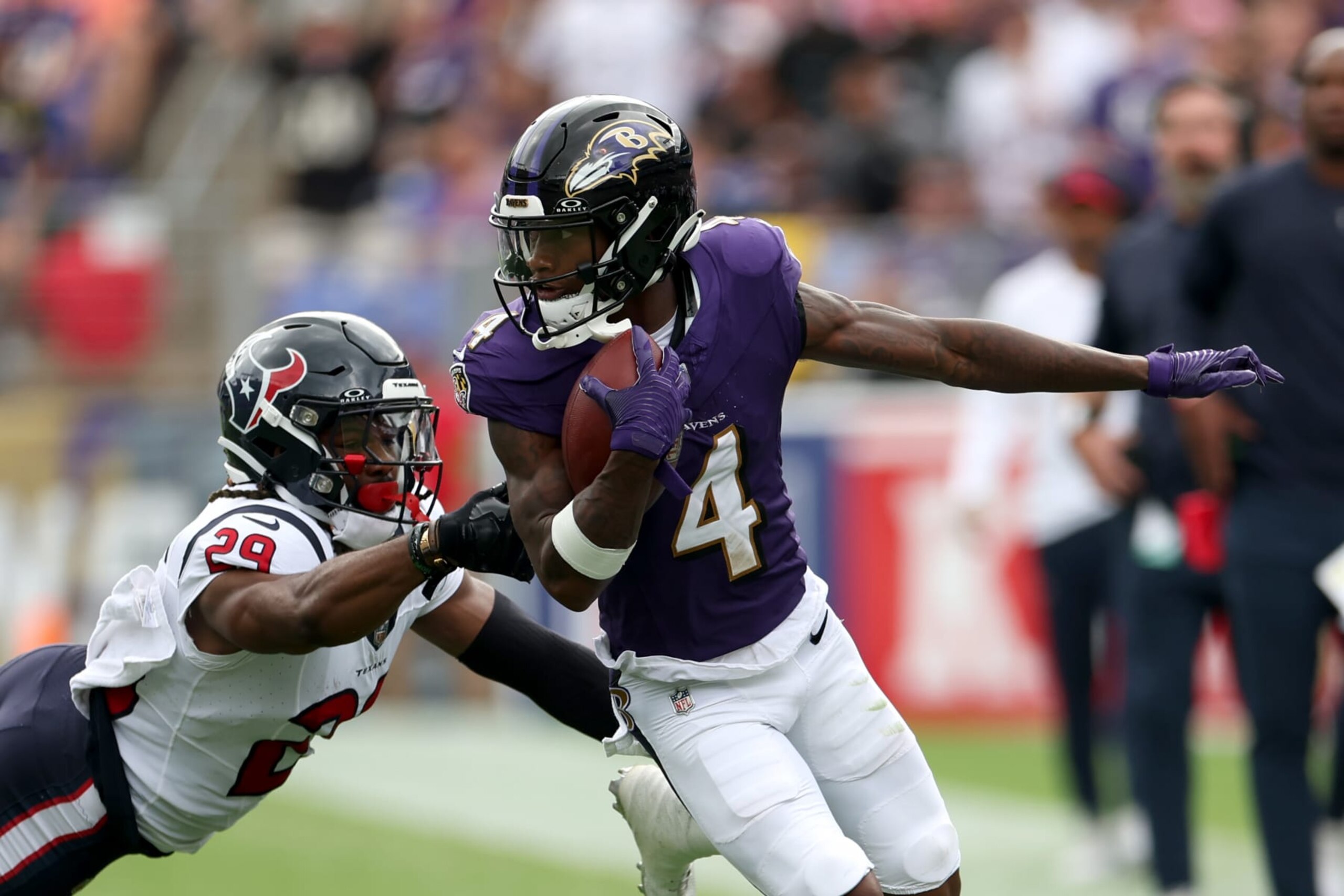 BALTIMORE, MARYLAND - SEPTEMBER 10: M.J. Stewart #29 of the Houston Texans tackles Zay Flowers #4 of the Baltimore Ravens after Flowers caught a second half pass at M&T Bank Stadium on September 10, 2023 in Baltimore, Maryland. (Photo by Rob Carr/Getty Images)